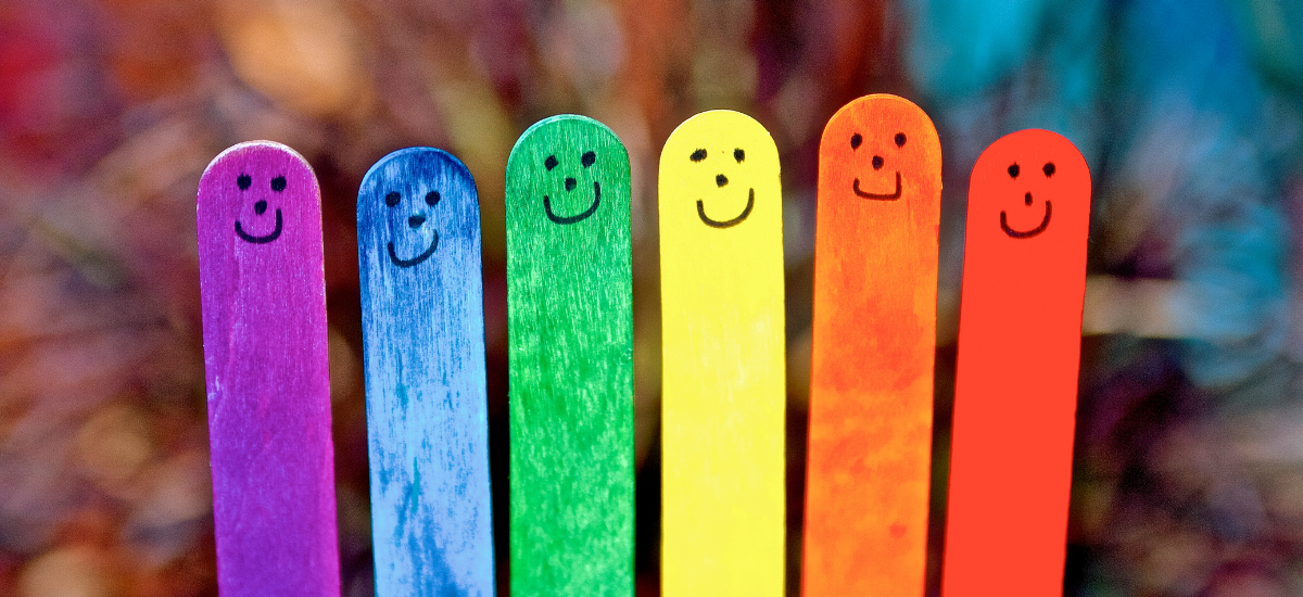 coloured lolly sticks with smiley faces