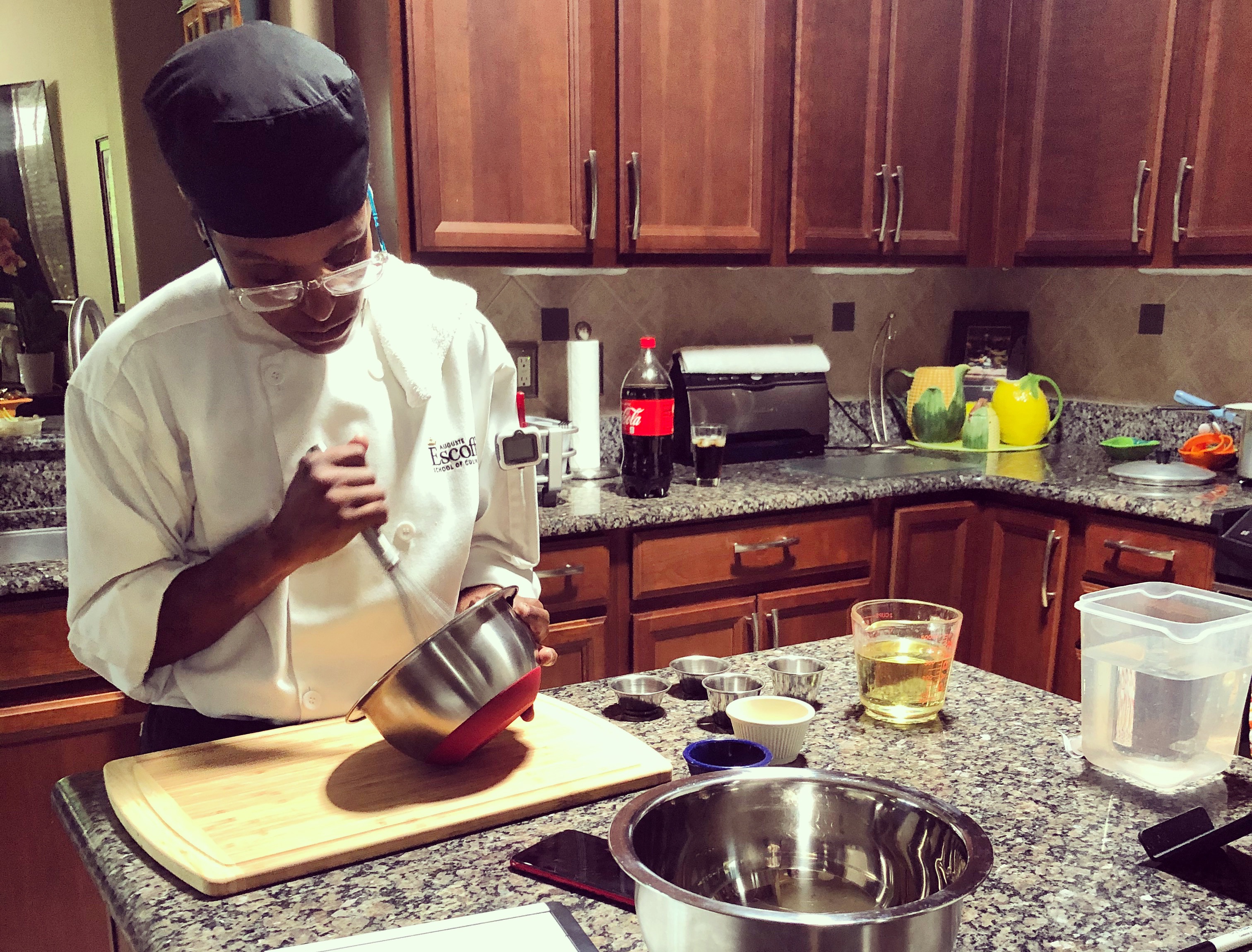 Making Mayonnaise for the first time in online Culinary Foundations.
