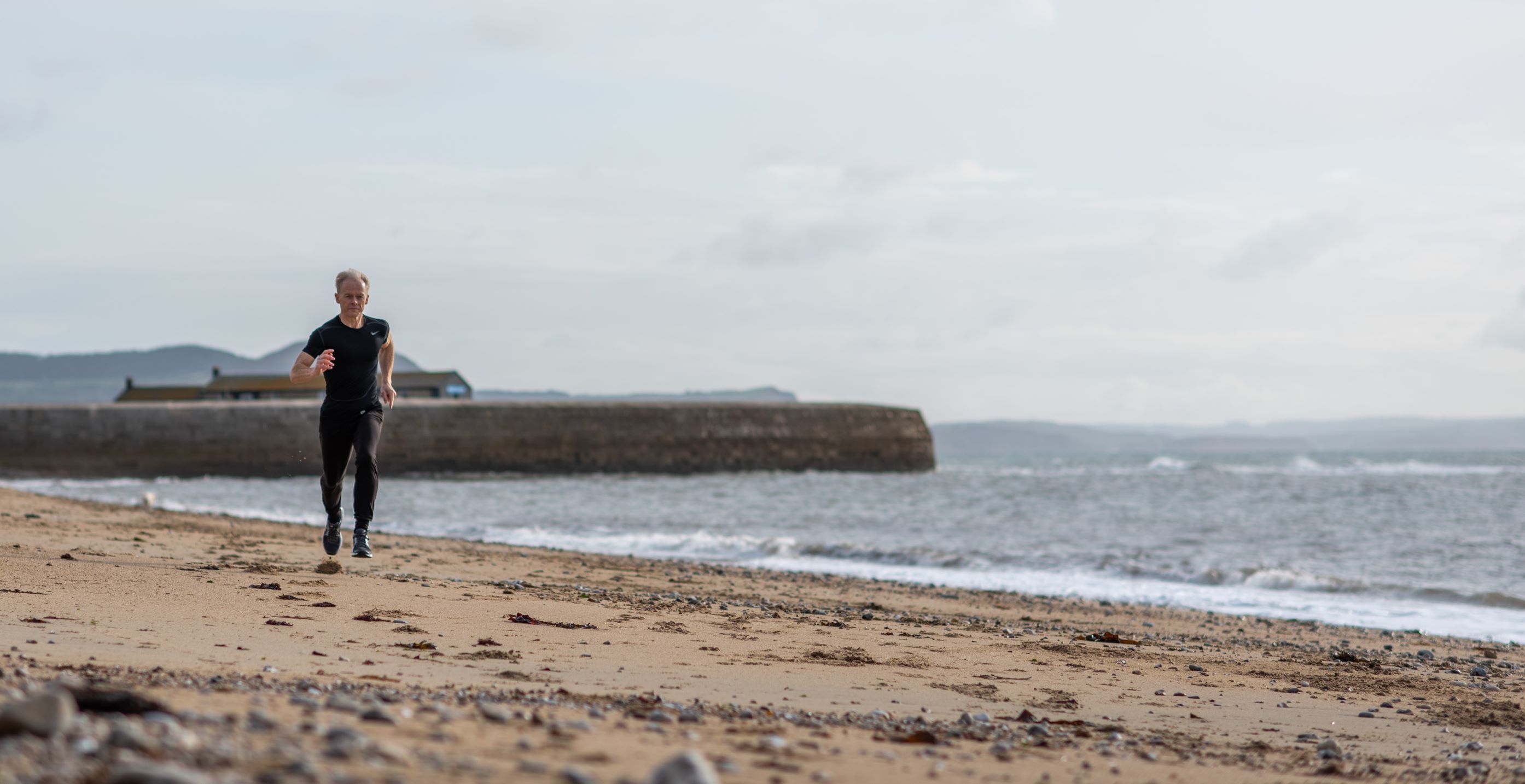 Running along Lyme beach