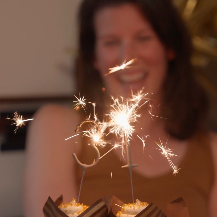 Birthday girl and sparkler candle that says 31