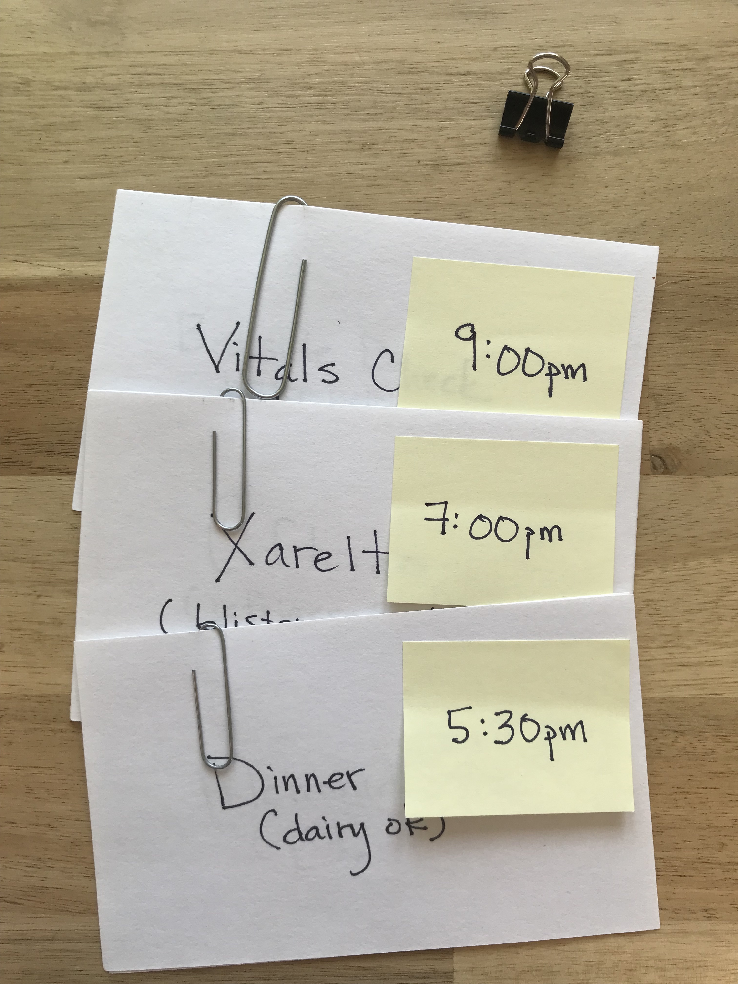 image of stacks of index cards with sticky notes with times