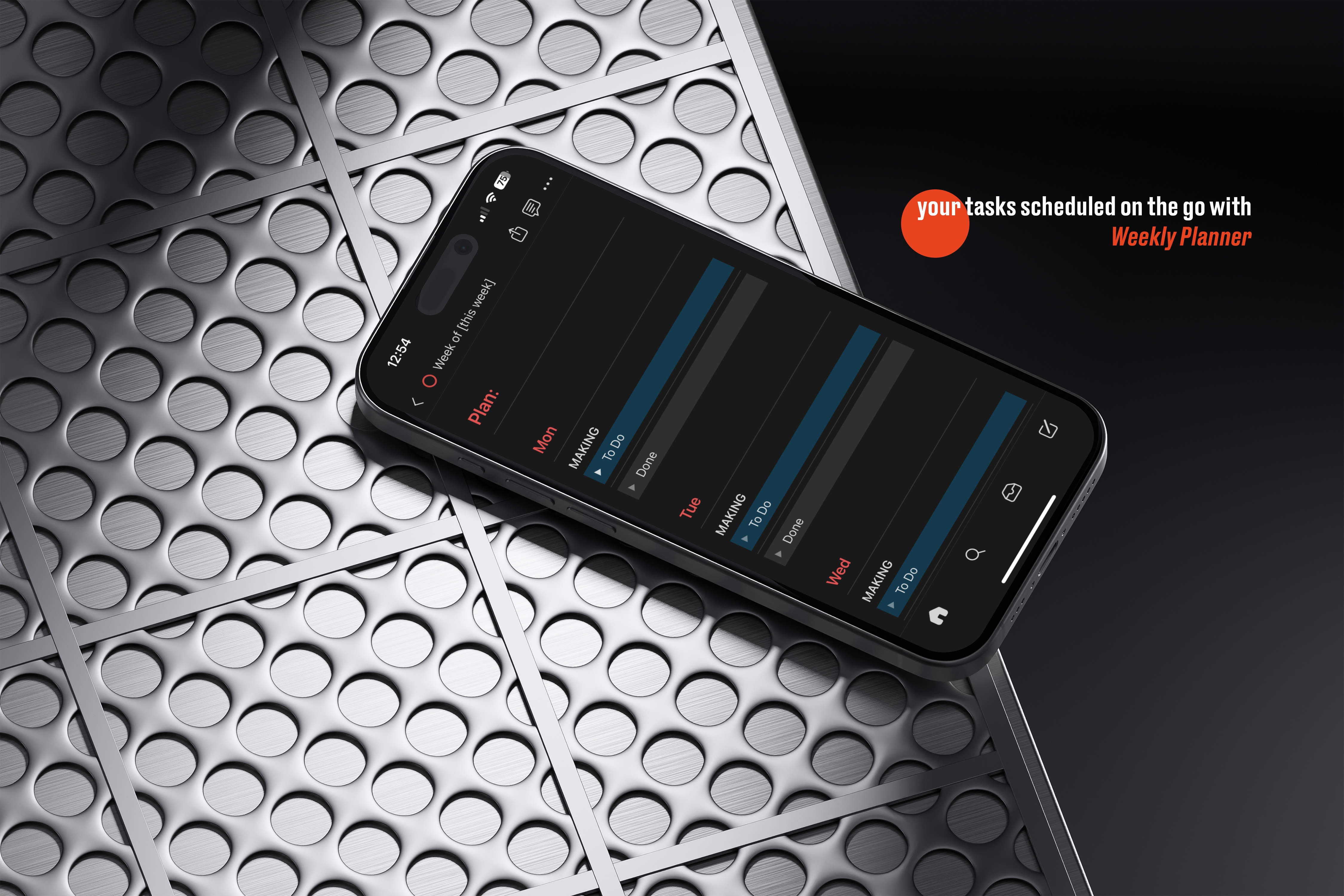 A smartphone displaying the Weekly Planner section of a Notion template, with tasks organized by day and labeled Making and Managing in a dark interface. The phone rests on a modern, metallic surface with a perforated circular pattern. A caption in the top-right corner reads, Your tasks scheduled on the go with Weekly Planner, with Weekly Planner highlighted in orange. The image emphasizes the convenience of managing tasks on the go.