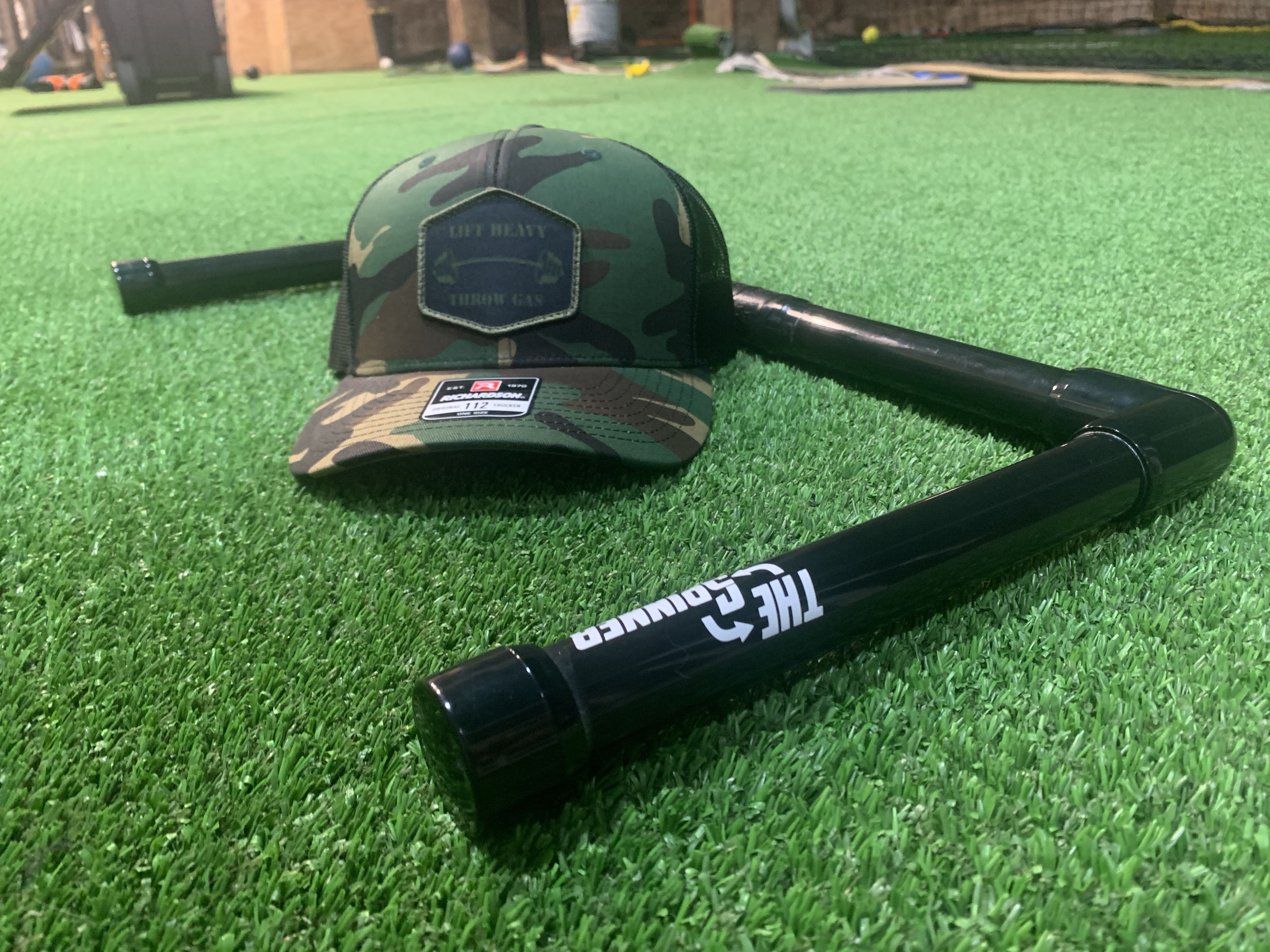 Strength training for baseball players focusing on shoulder and arm muscles to throw harder