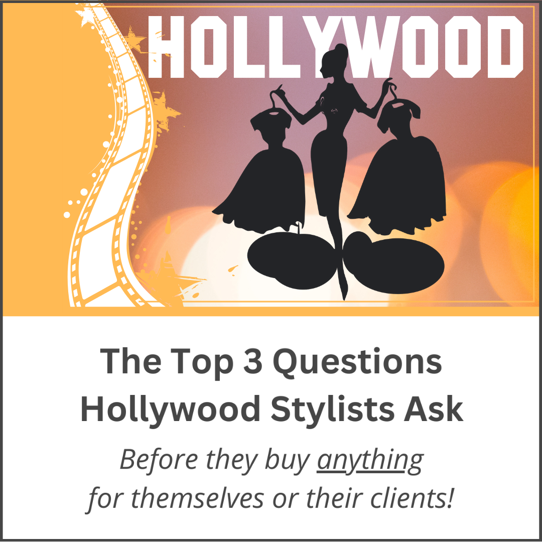 Hollywood stylist holding dresses on hangers in each hand
