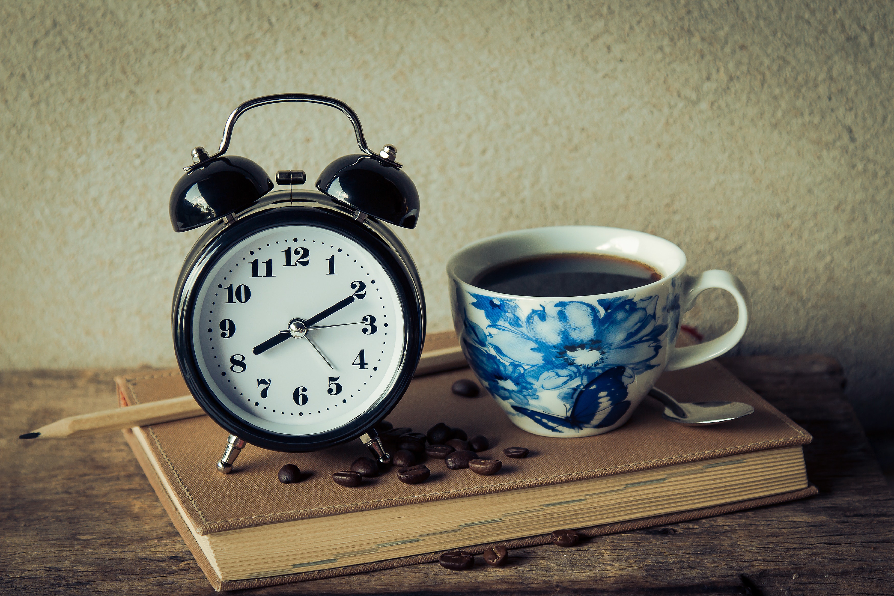 Clock and coffee cup