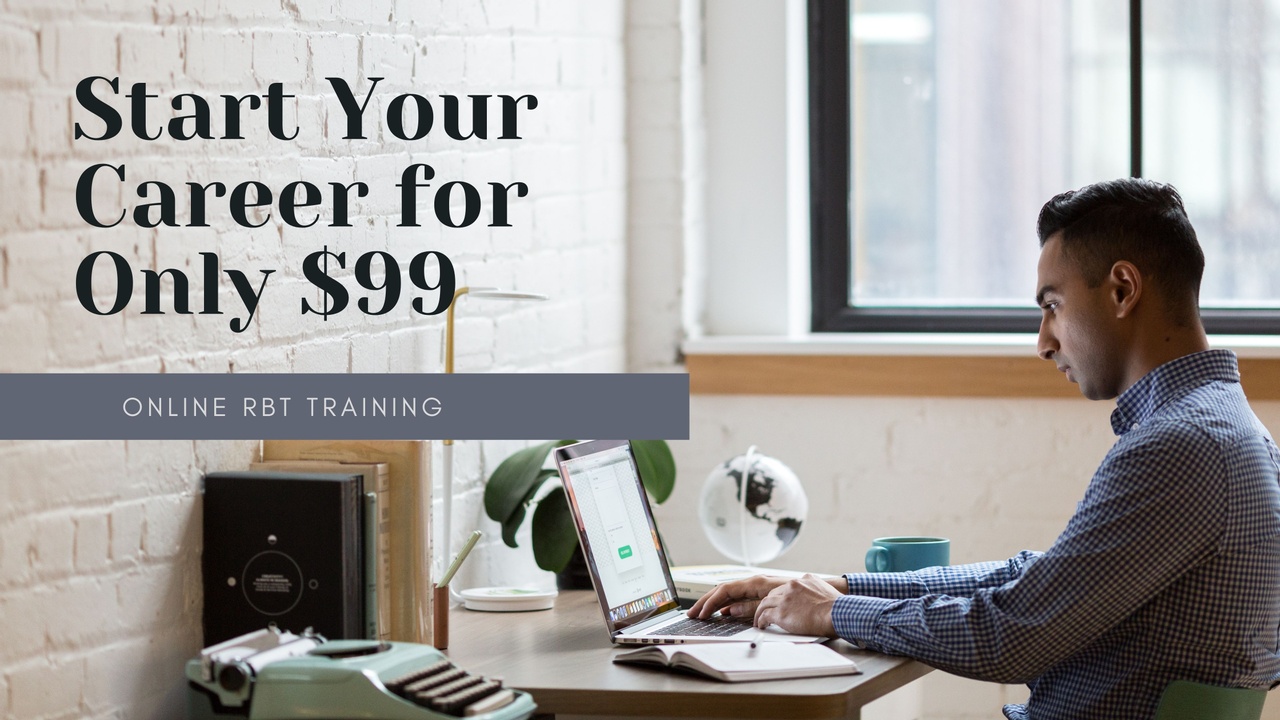 Man at desk in home office with laptop computer