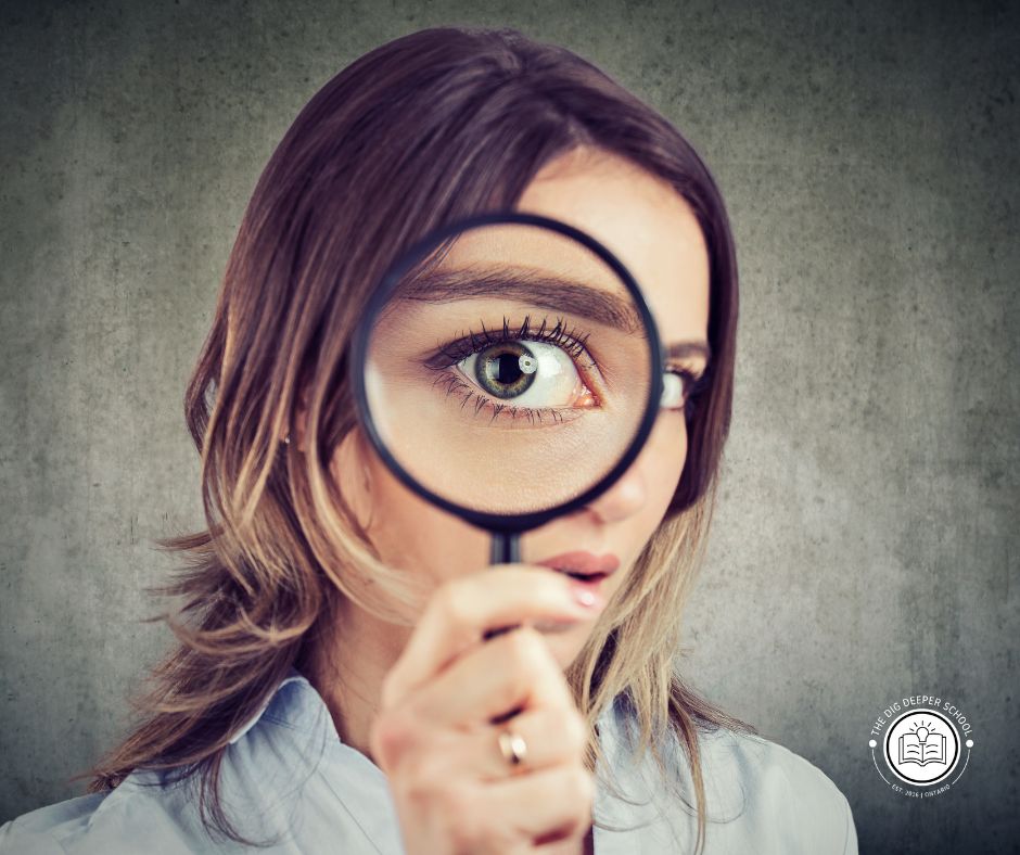 Image of young woman with a magnifying glass over her magnified green eye