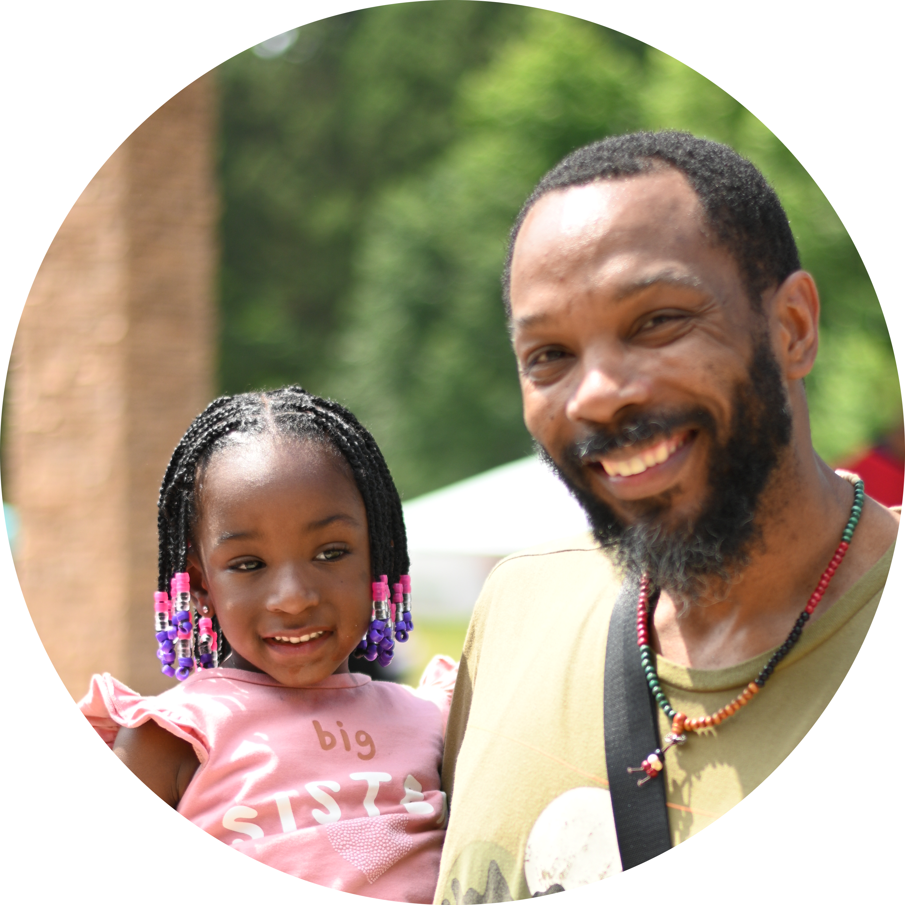 black dad with toddler daughter