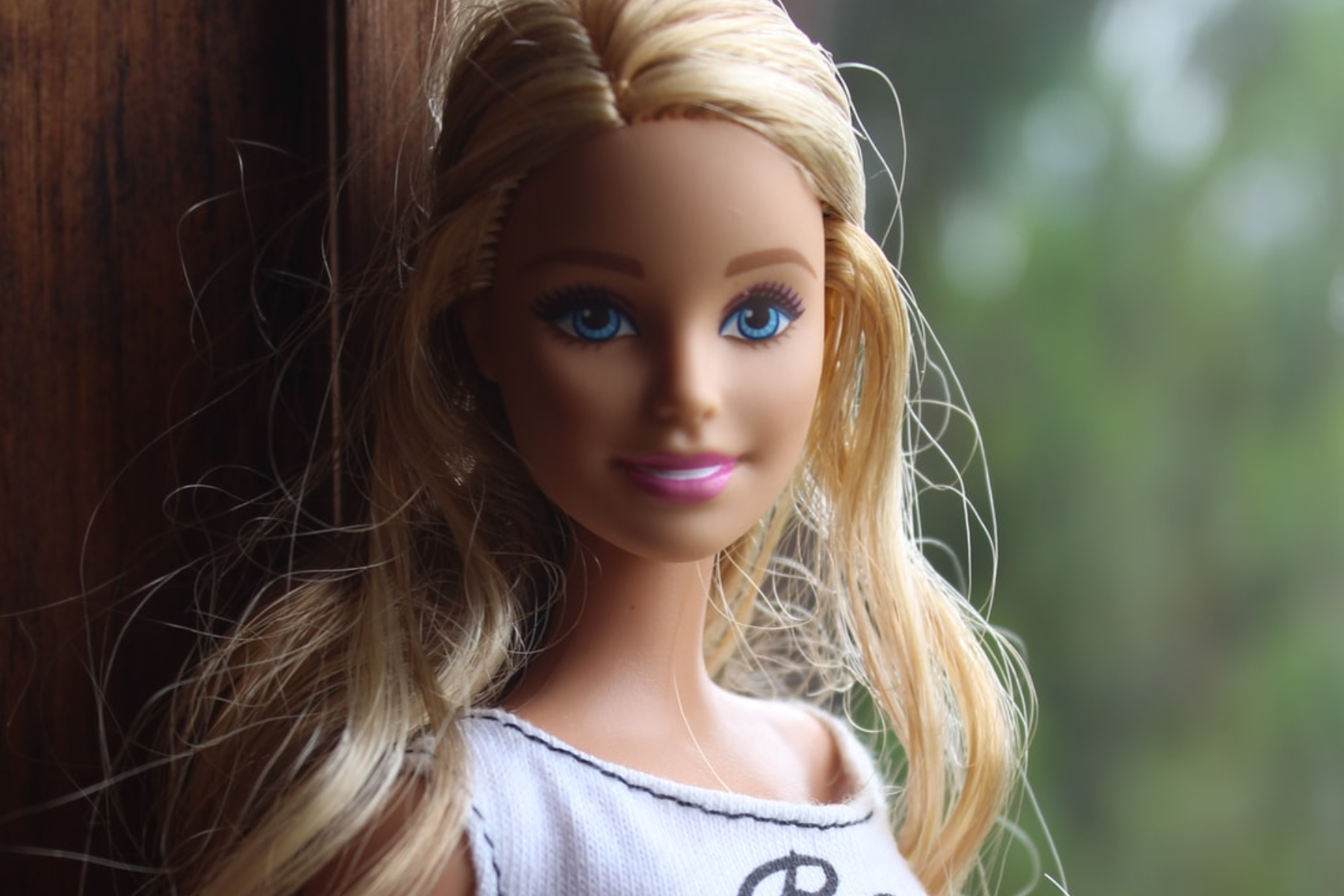 A close up of a Barbie doll