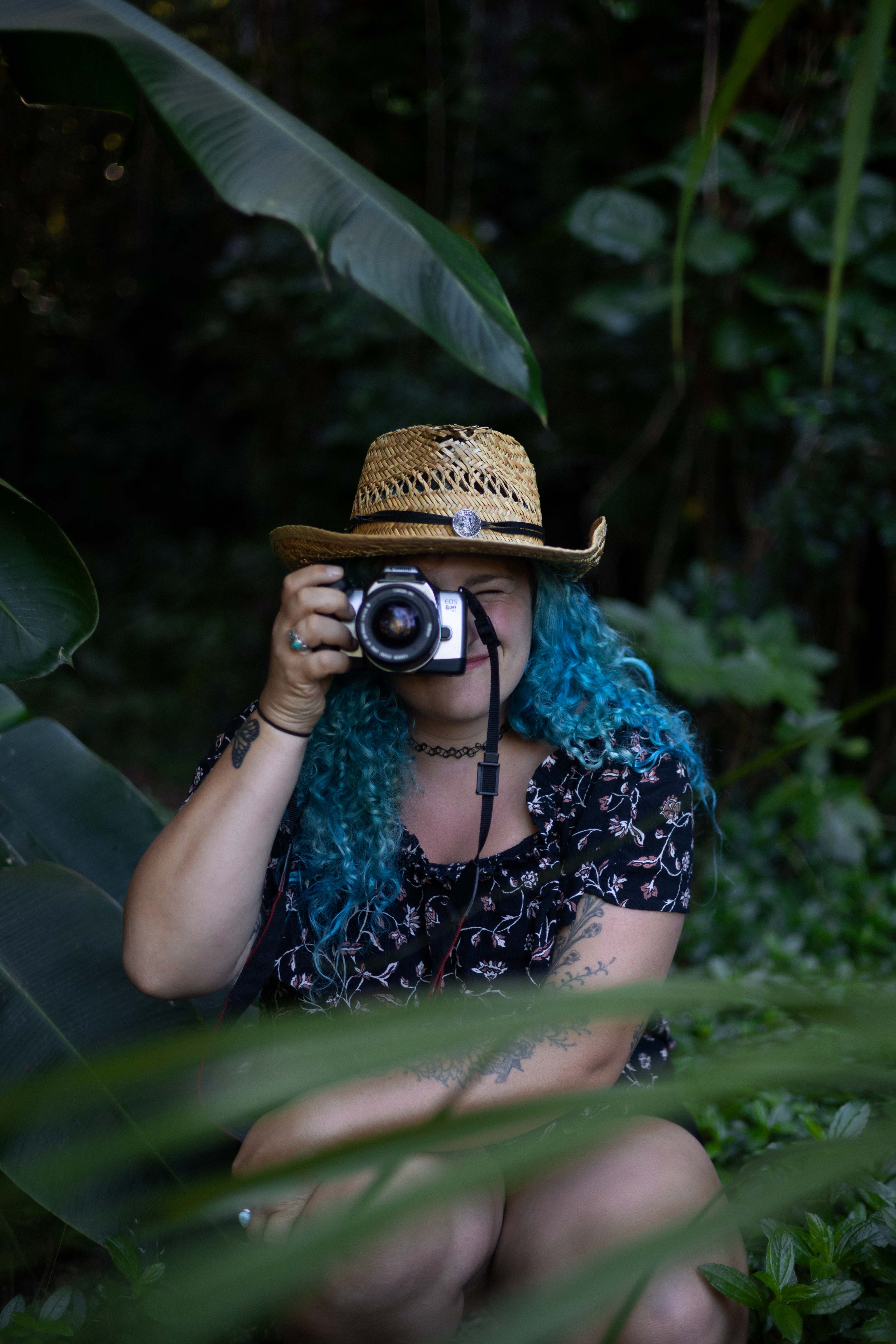 girl with camera in Hawaii