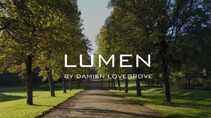 An avenue of trees with the title LUMEN superimposed