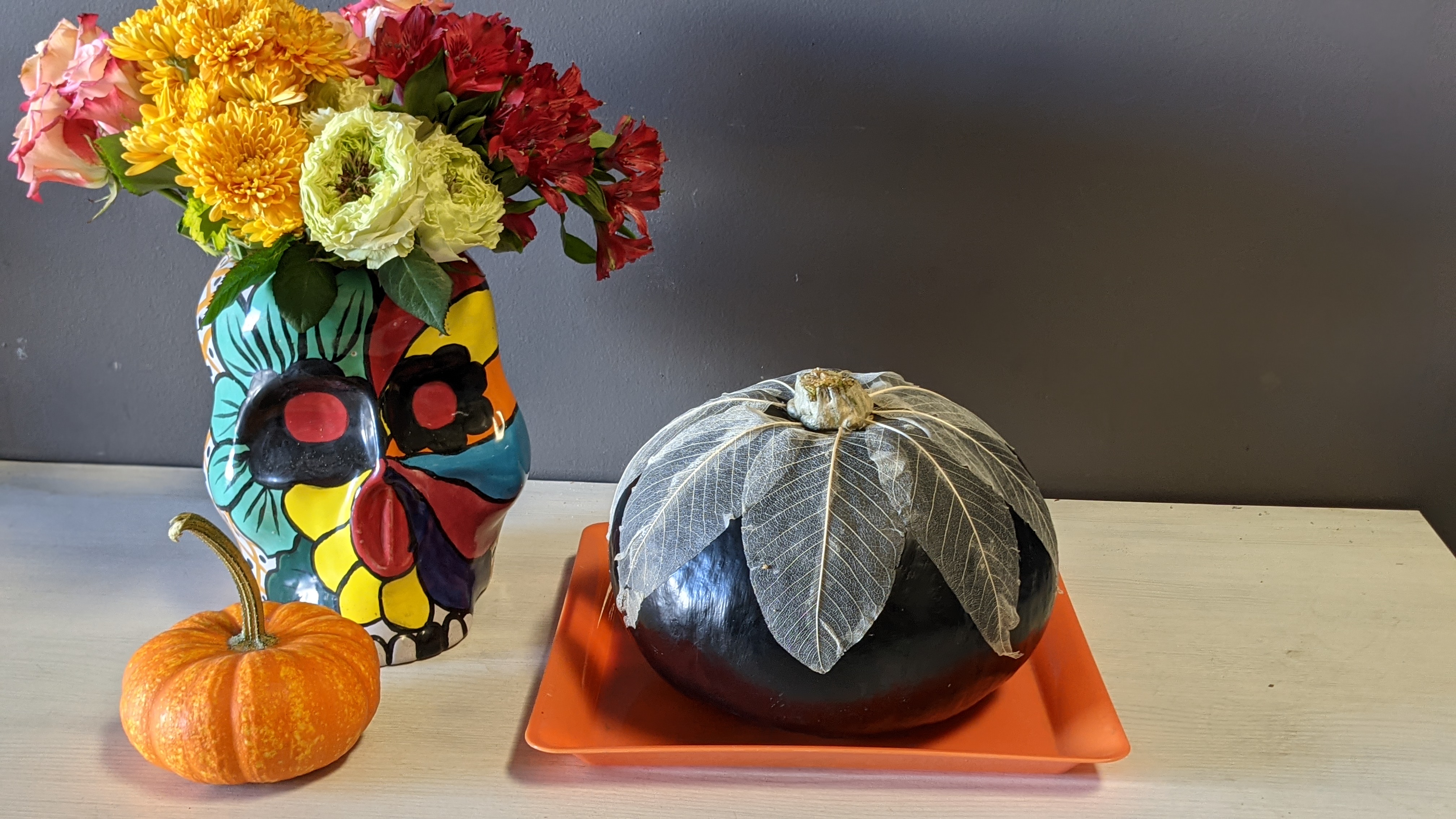 Black Pumpkin with White Leaves