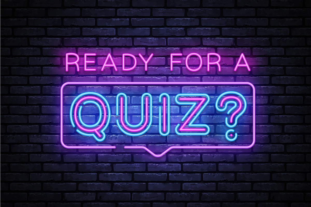 A neon sign that reads Ready For A Quiz?