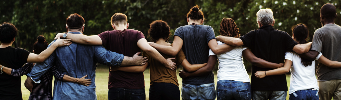 10 people from behind with arms around each other side to side