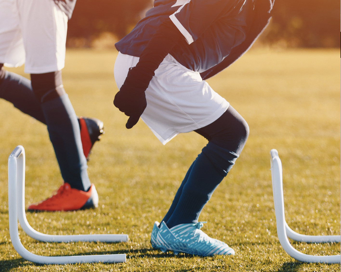 Athletes performing lunges for injury prevention. Lunges are excellent to strengthen the quads and thus prevent ACL injury, or ankle injuries.