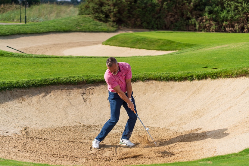 Phil Allen performing a bunker shot