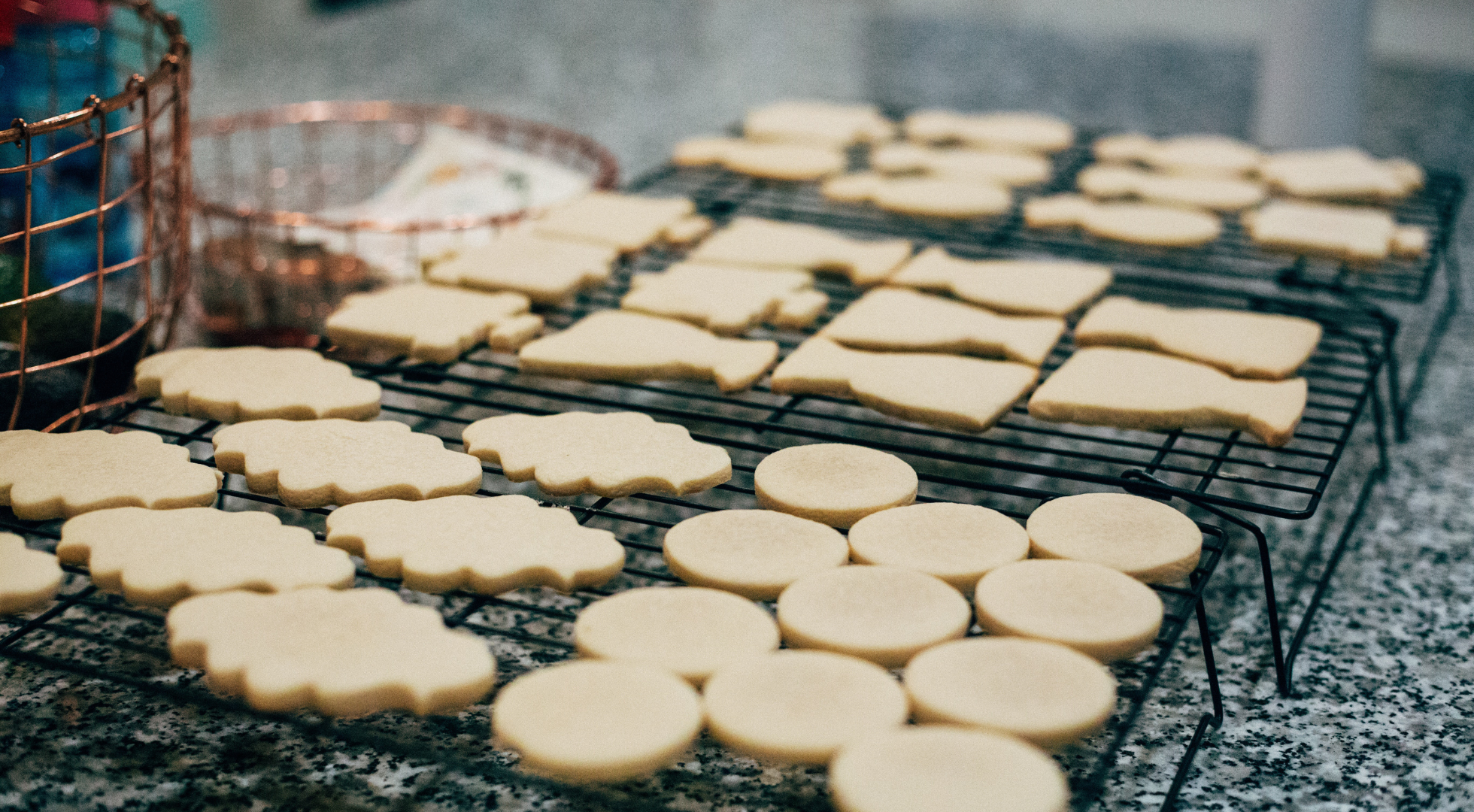 Preview image of a cookies on a cooling rack that illustrates an article on the Sugar Coin Academy blog that discusses the basics of selling food from home under the Cottage Food Laws.