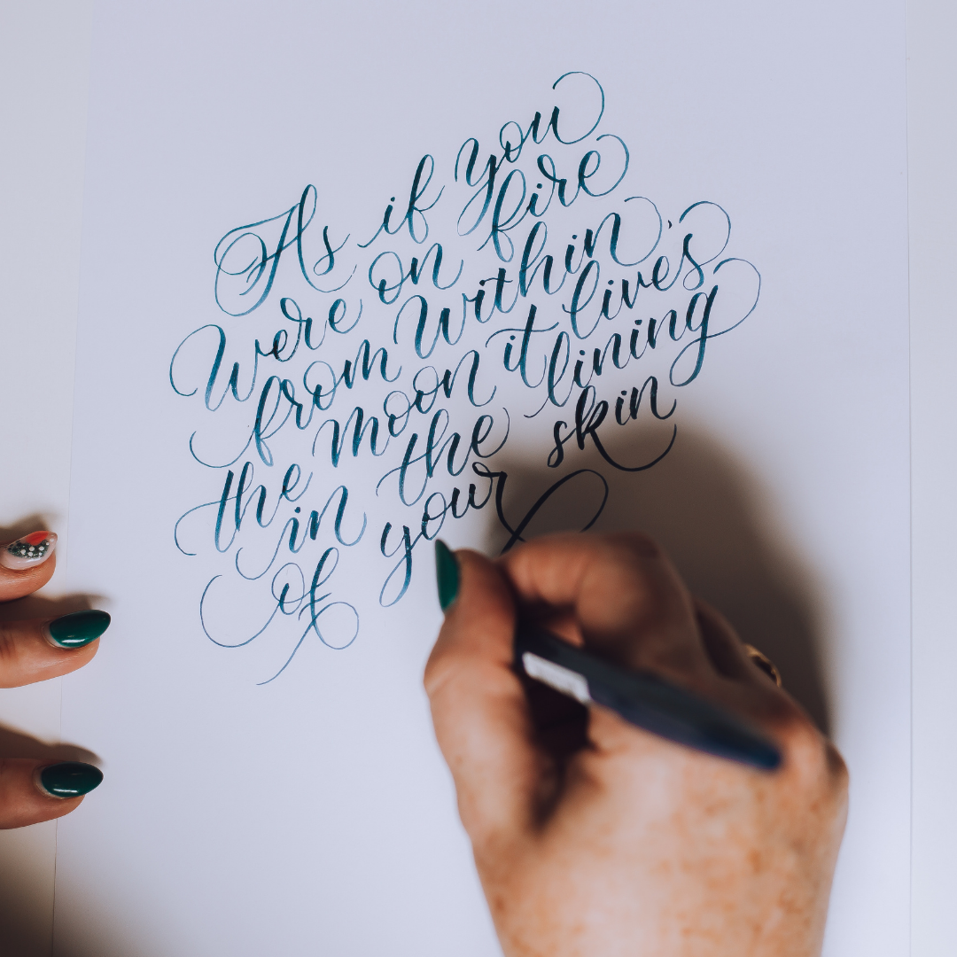 Jen writing in a modern calligraphy style