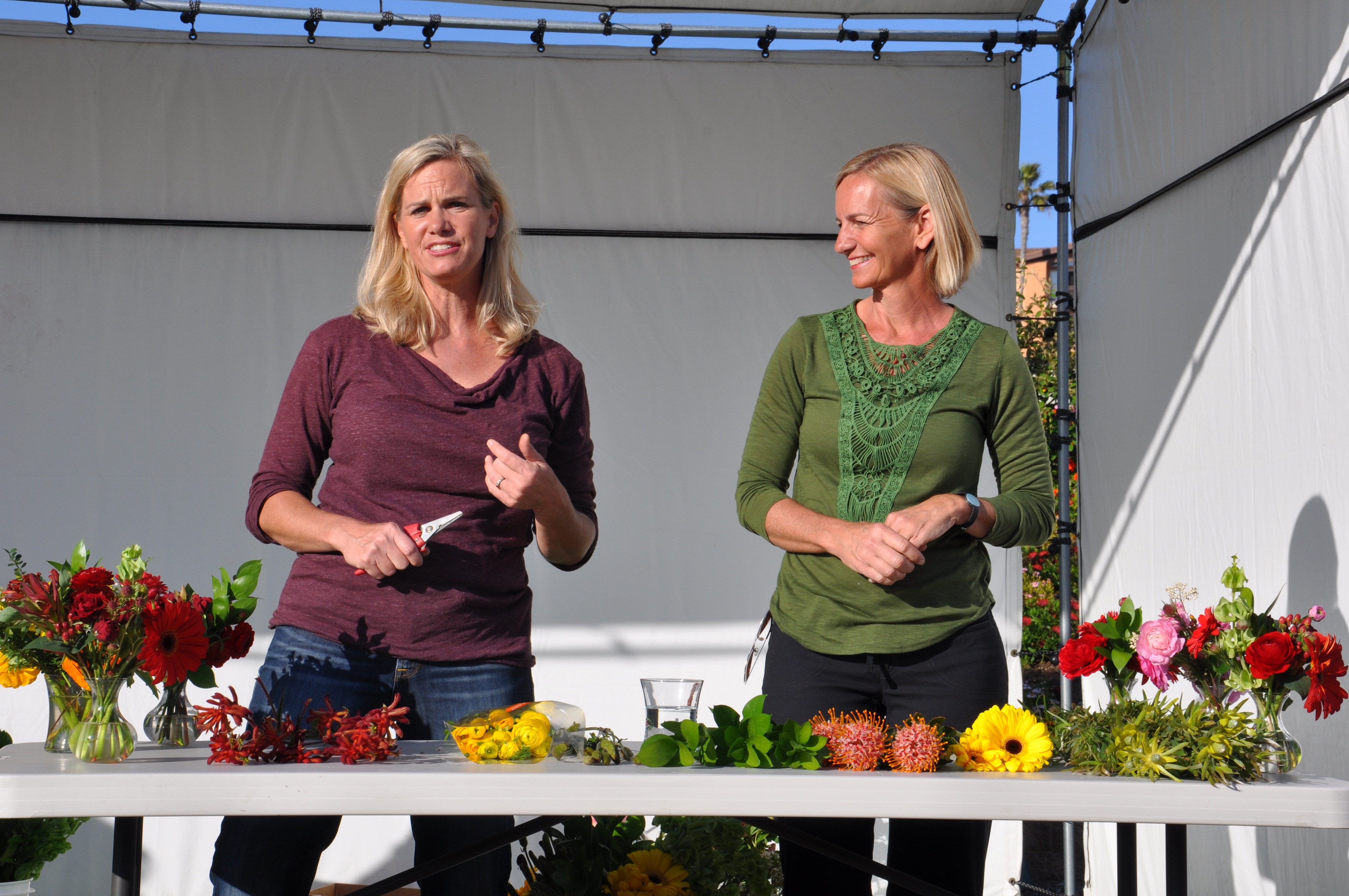 The Coleman sisters, Kit (left) and Casey (right) instruct guests at the Field to Vase dinner
