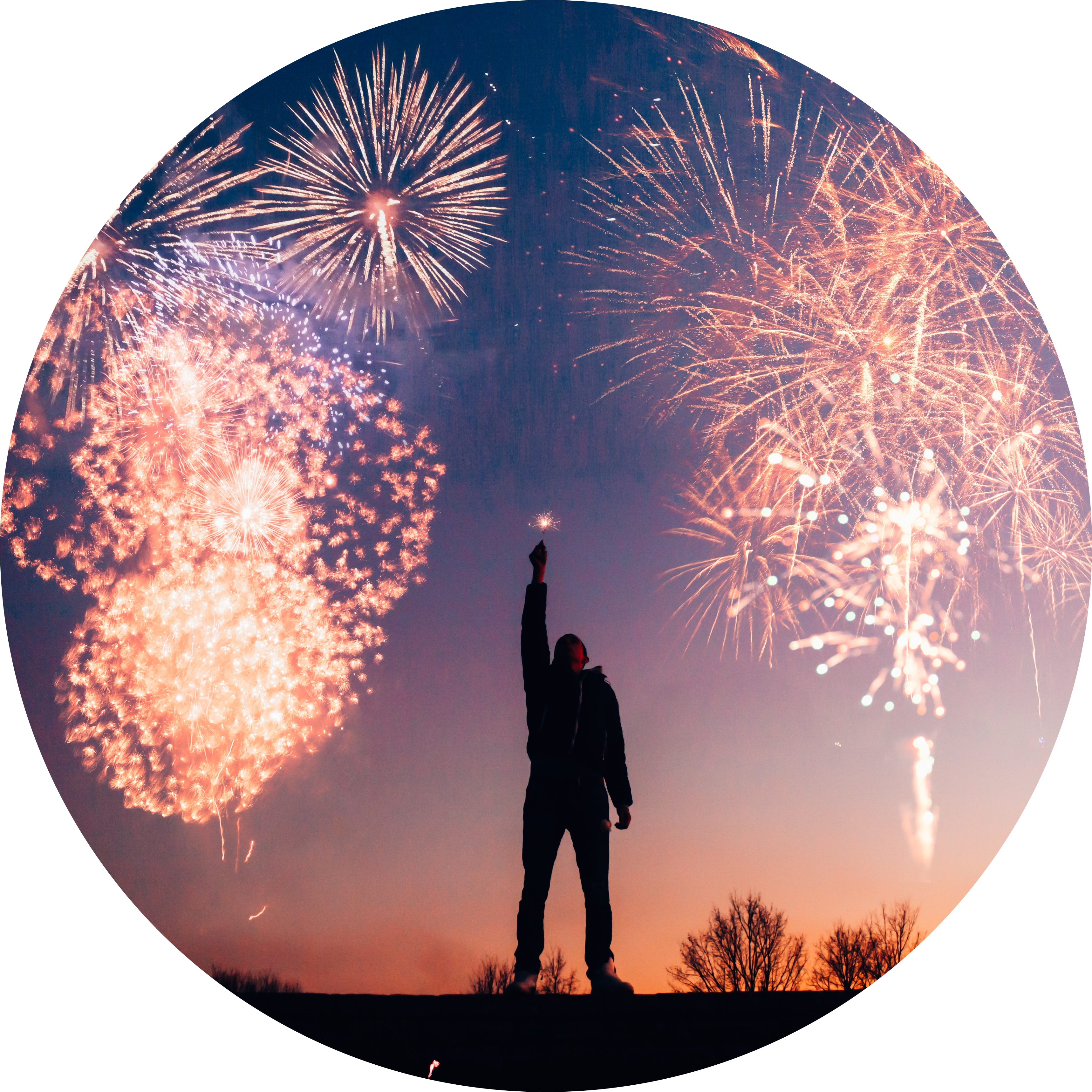 A man holds a sparkler and fireworks flash in the sky, a tribute to the changes he'll make in Psycophi’s mental health coaching program.