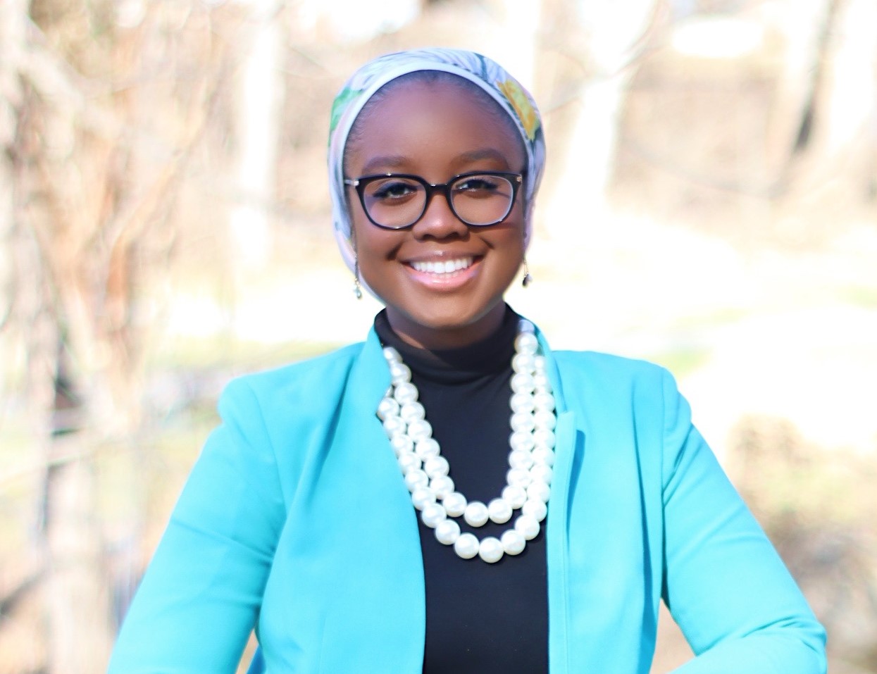 Photo of Fareedah Shaheed in blue blazer