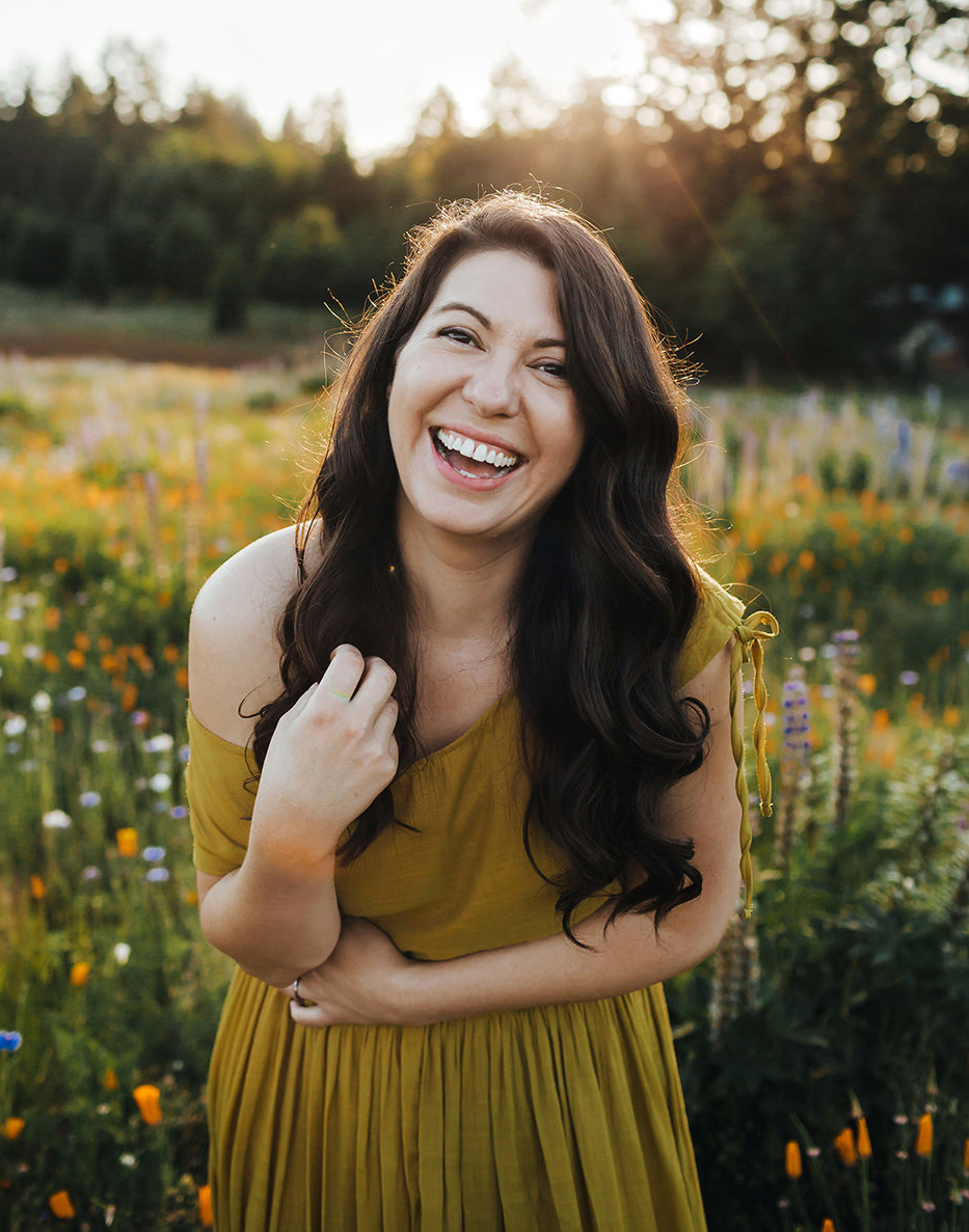 Becca from Becca Jean Photography laughing and looking to the side