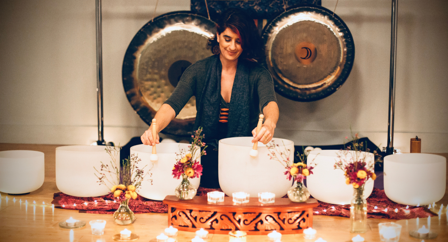 Melissa playing the quartz crystal bowls