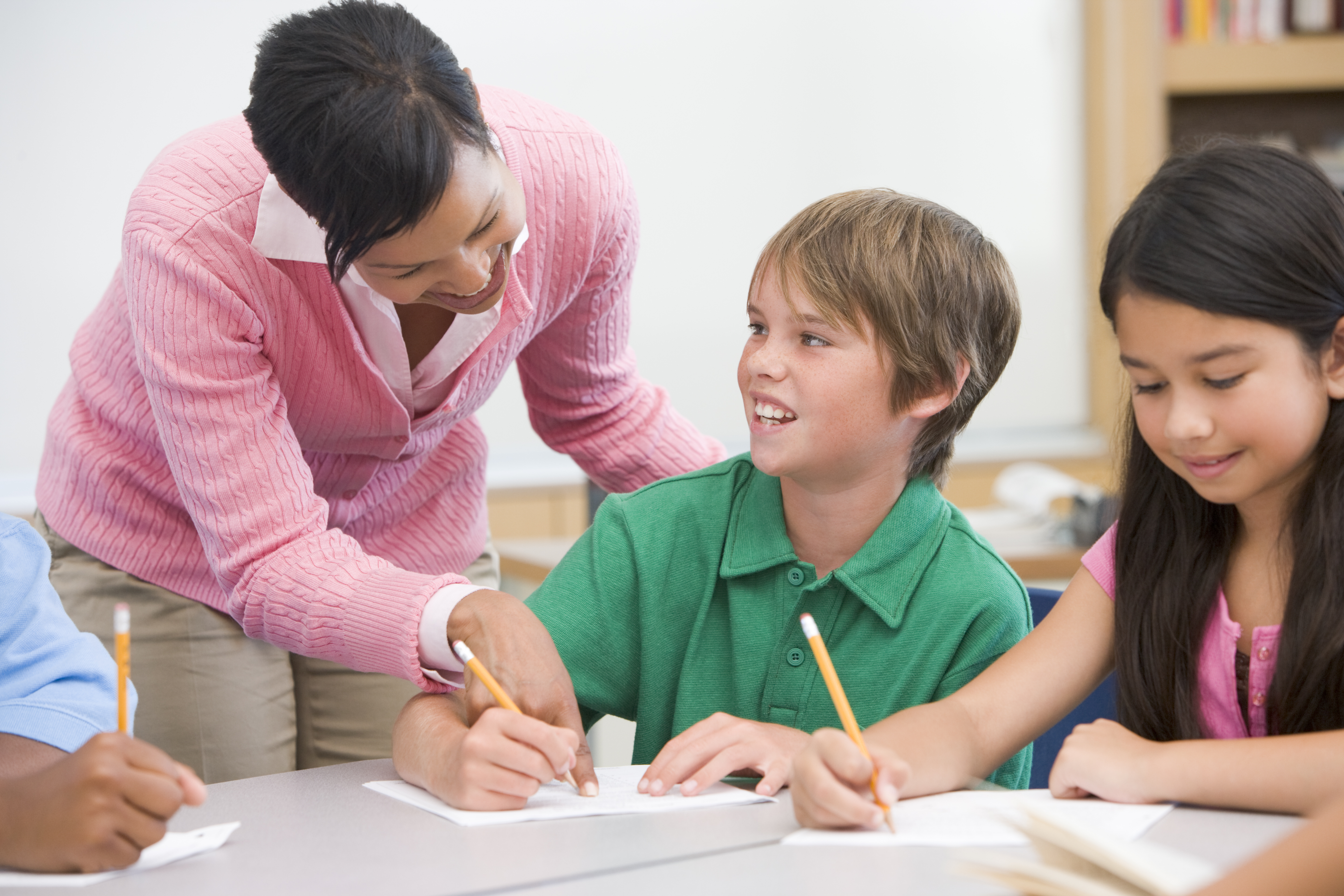 child with dyslexia boy with dyslexia teacher helping student with dyslexia