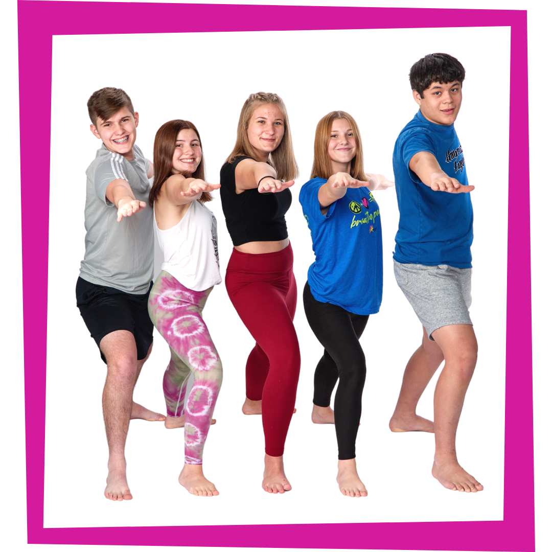 teens practicing warrior two pose