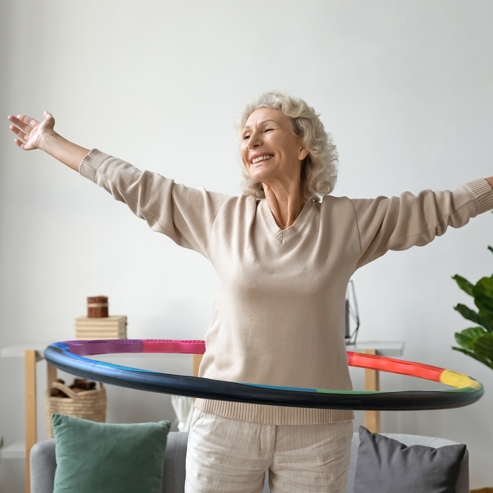 Woman at home with her Powerhoop