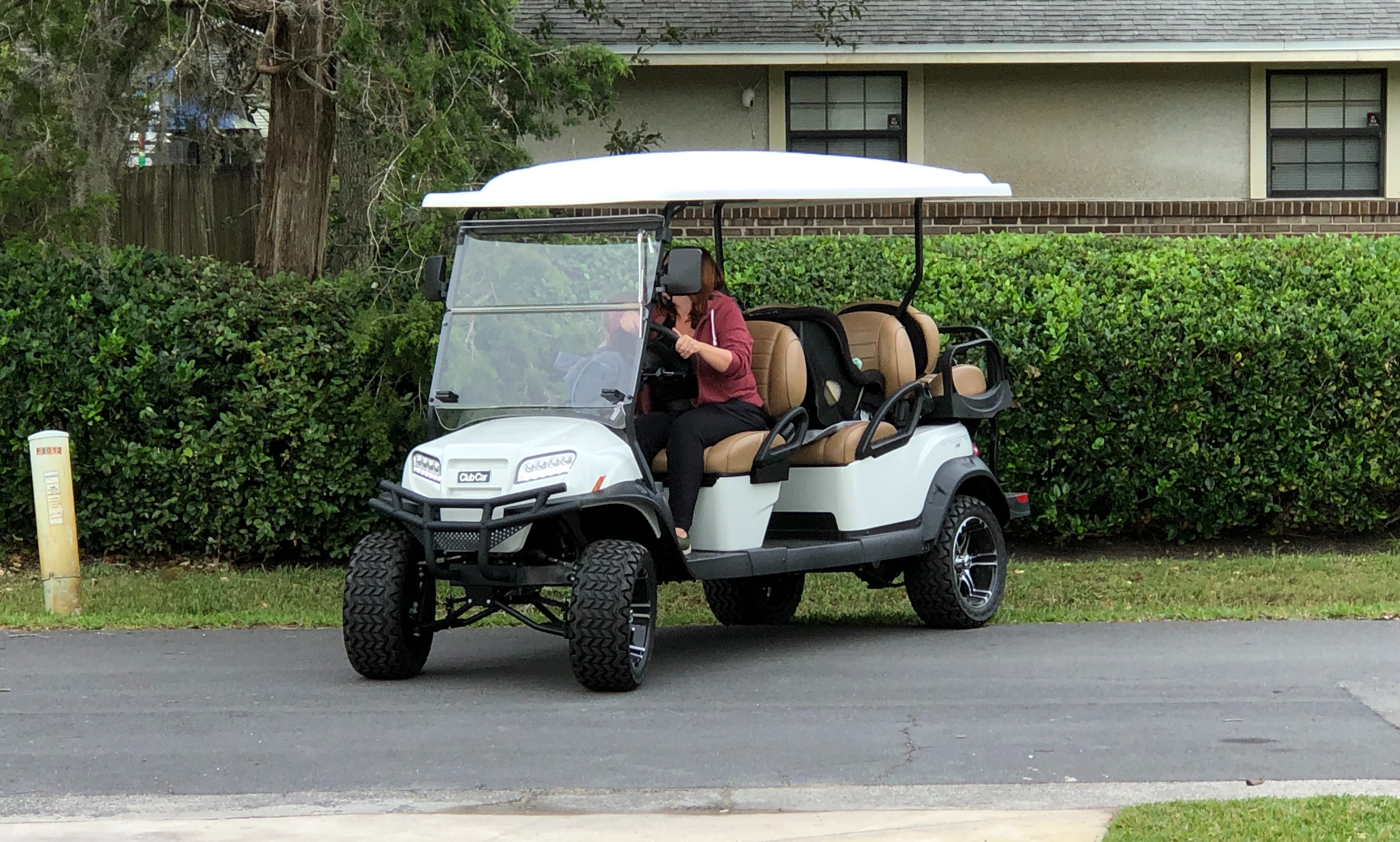 Street legal golf cart on the road