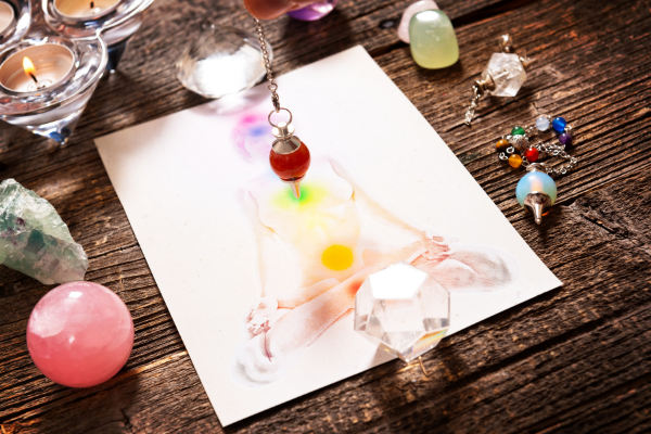 chakras and crystals on table