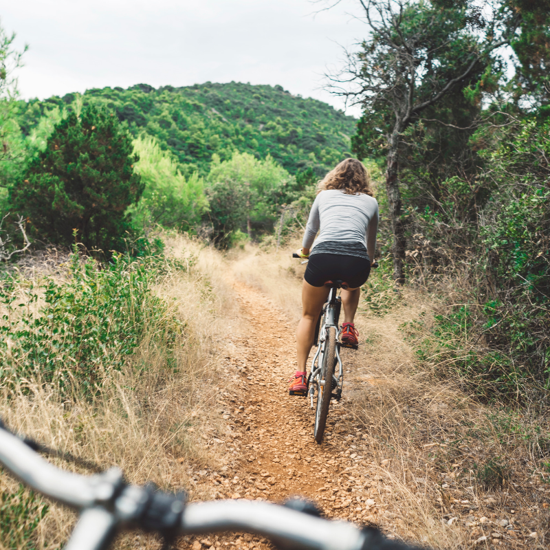 Cyclist exploring off-road