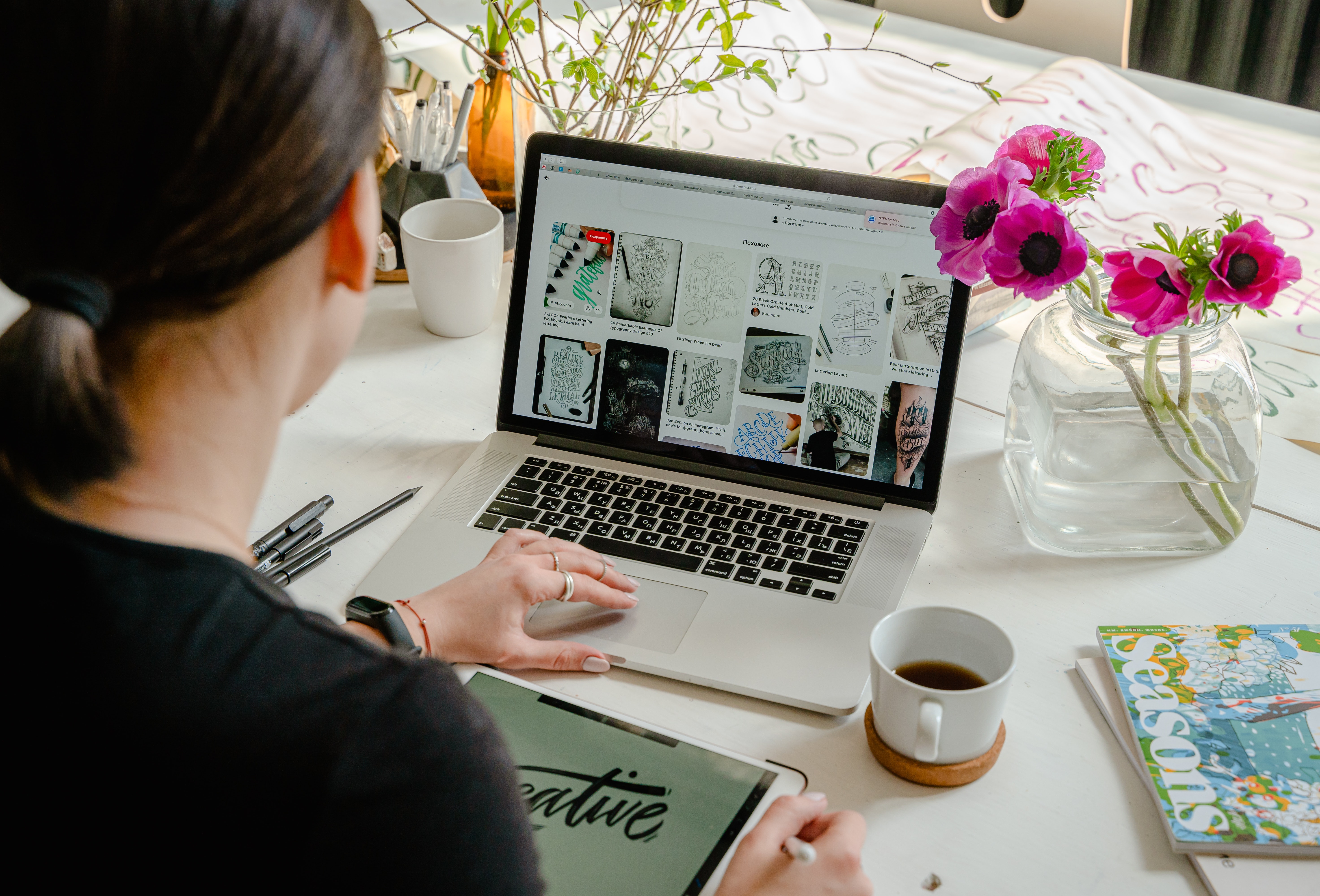 woman designing on laptop