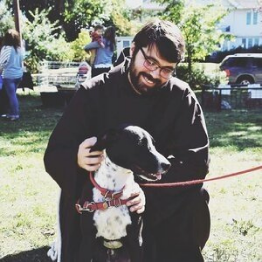 Luis with a dog