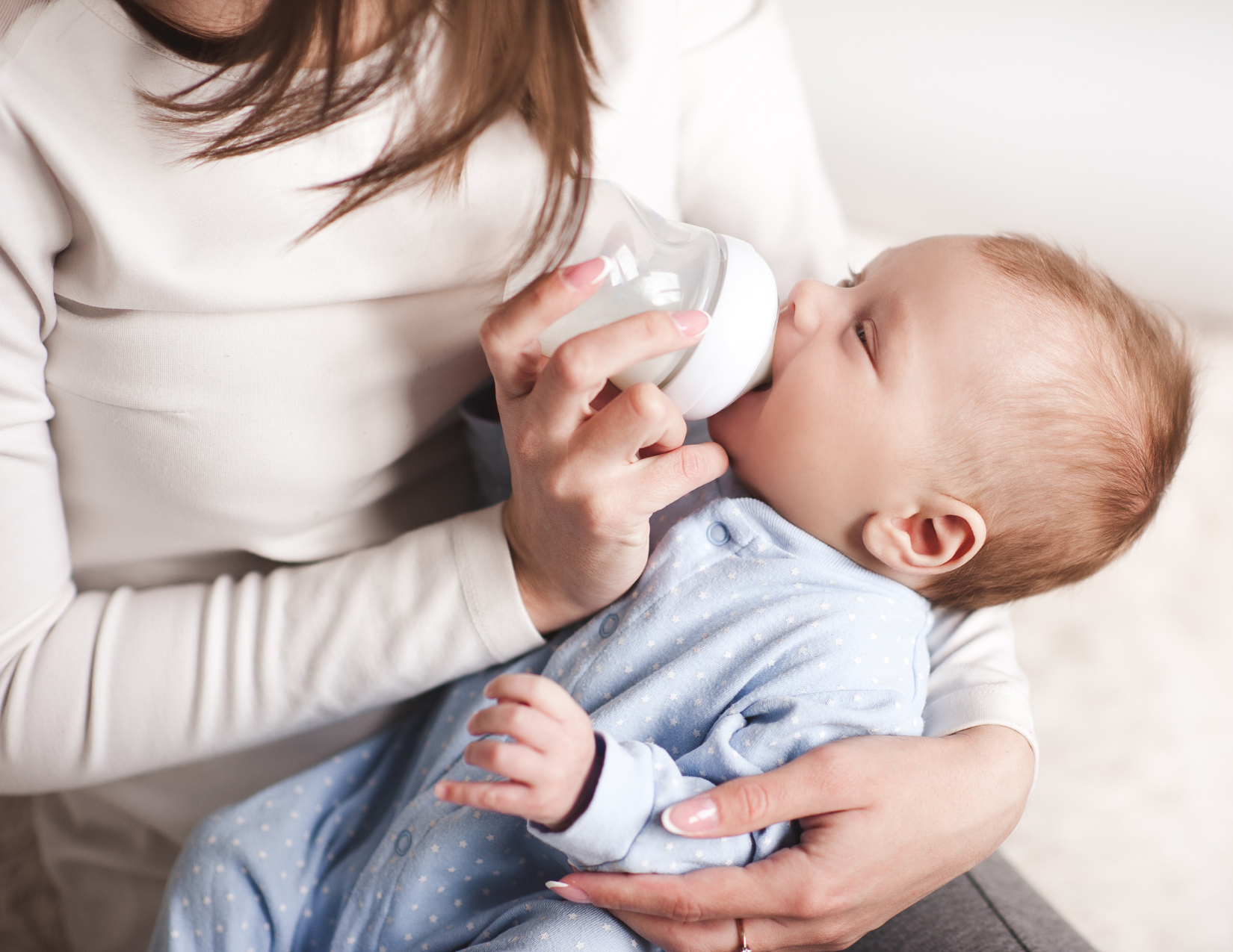 mother feeding baby