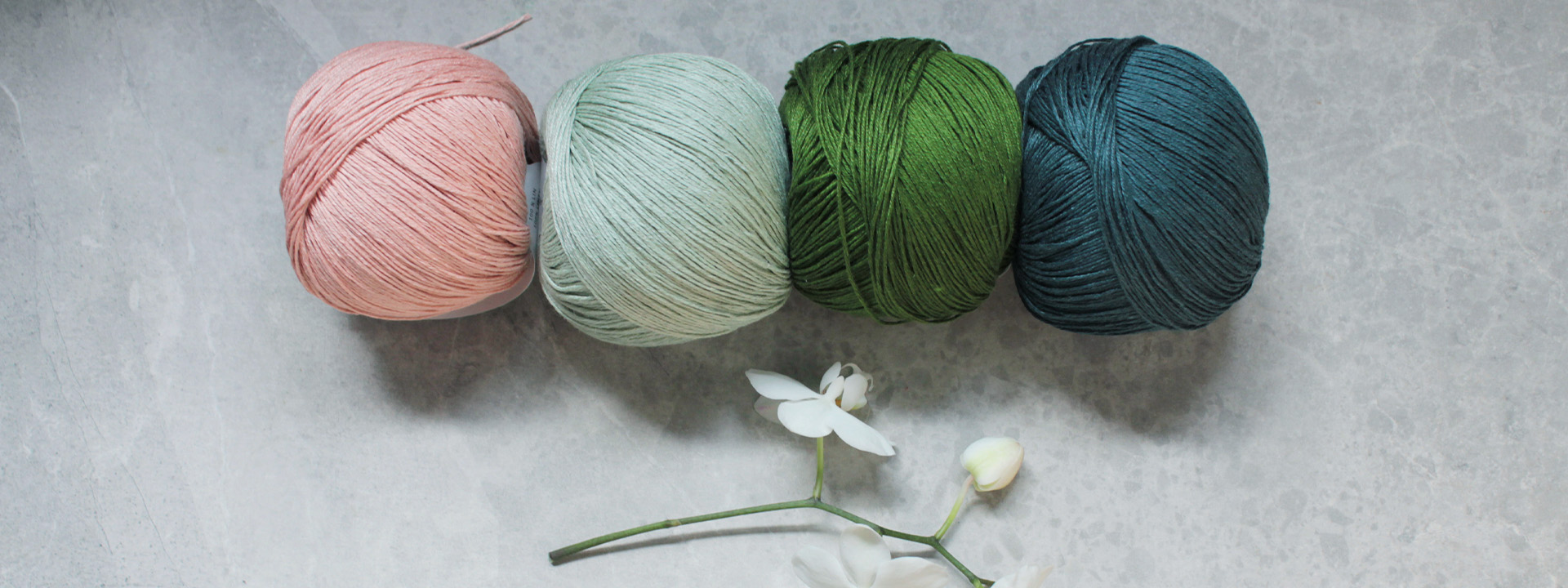 Four balls of silk yarn