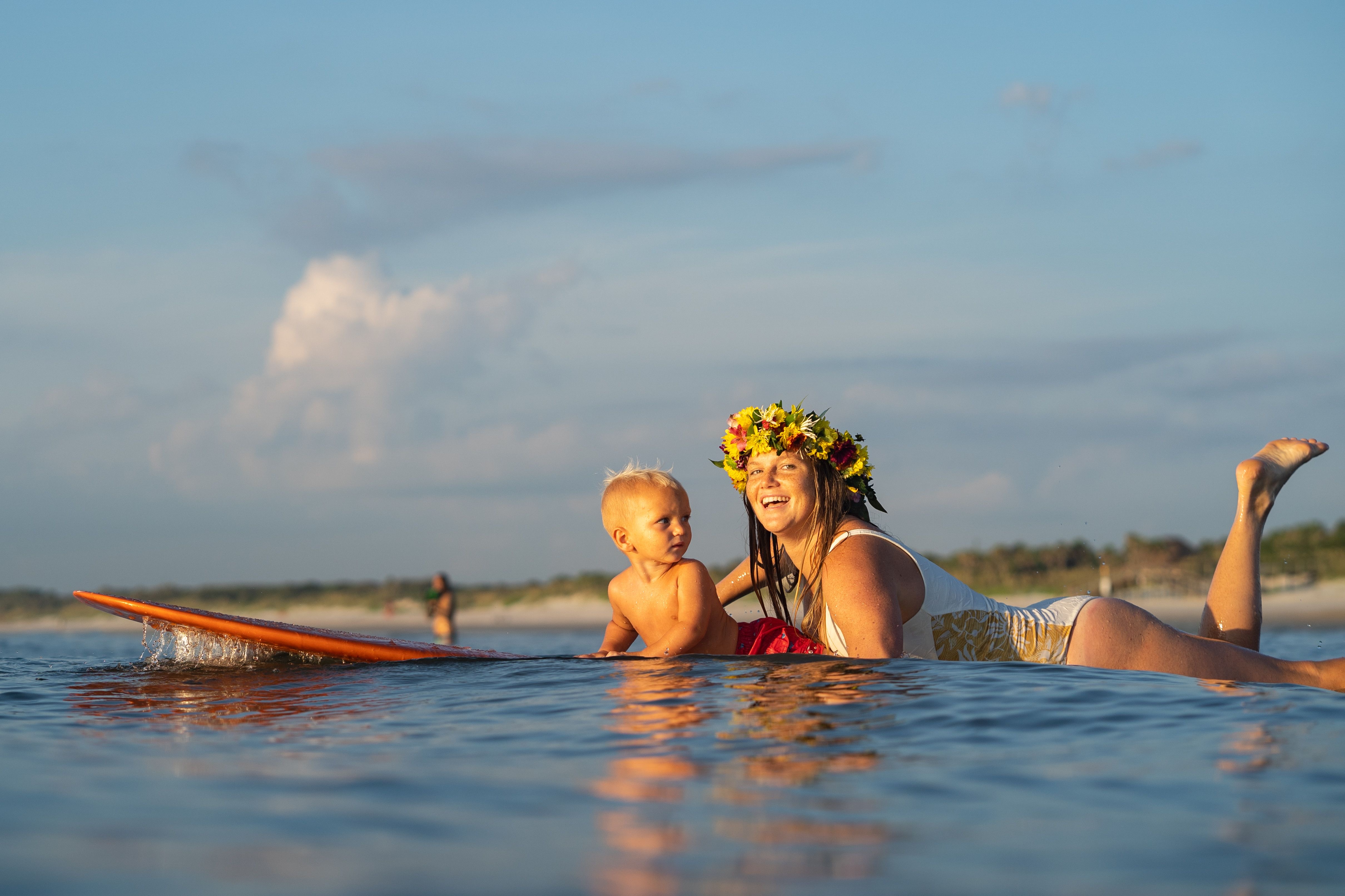 mom surfing with toddler