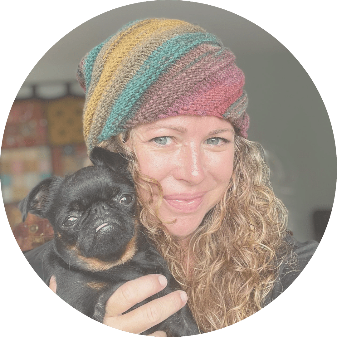 Picture of pet loss and grief support coach, Aurora, with her little Brussels Griffon, Nadi. 
