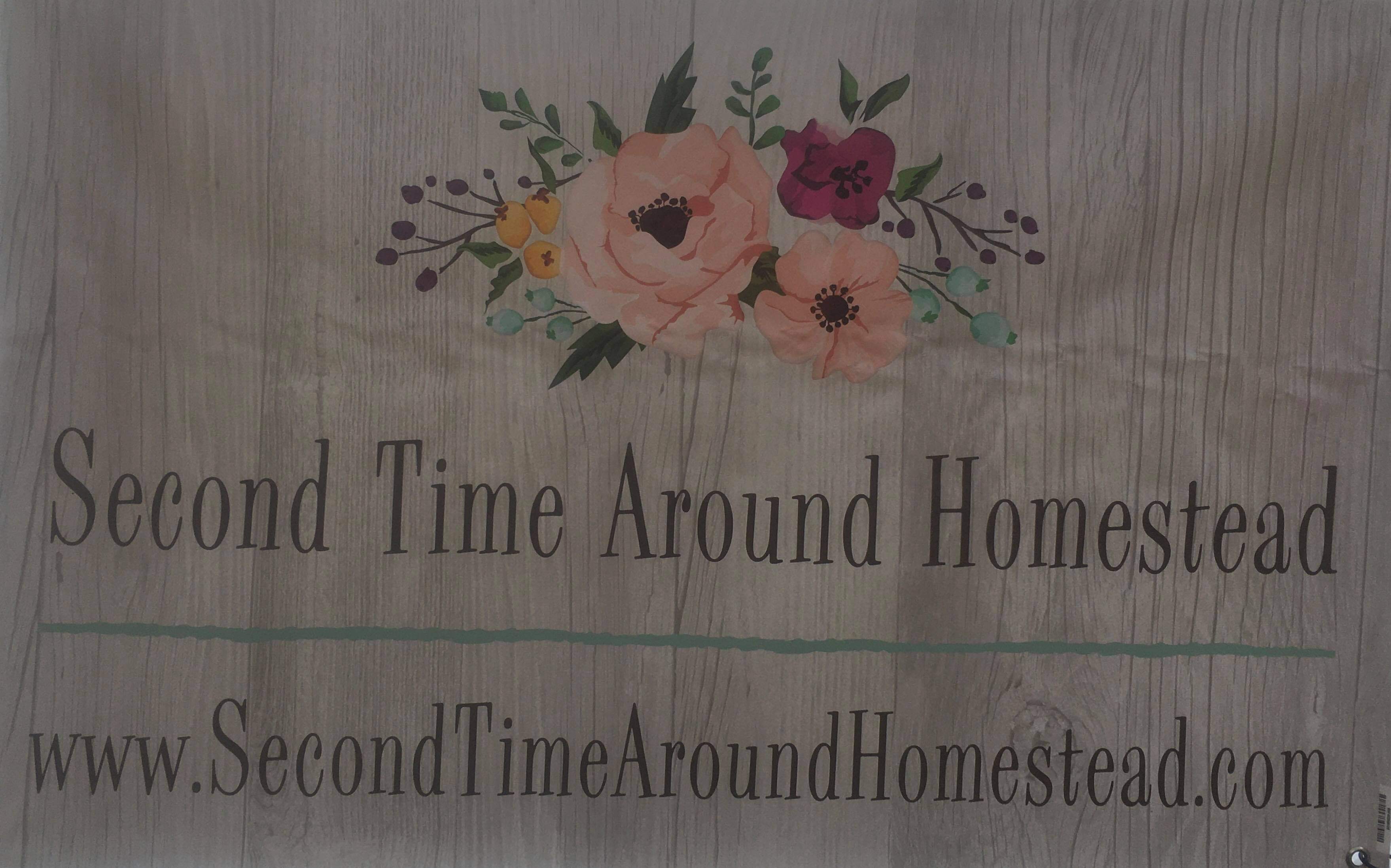 wooden background with flowers painted on and the name "Second Time Around Homestead"