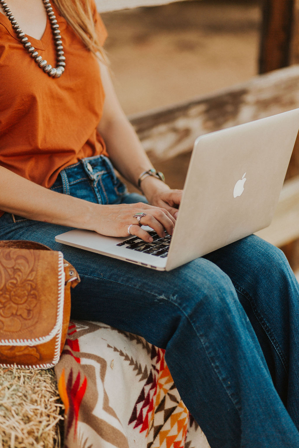 Woman typing on a computer