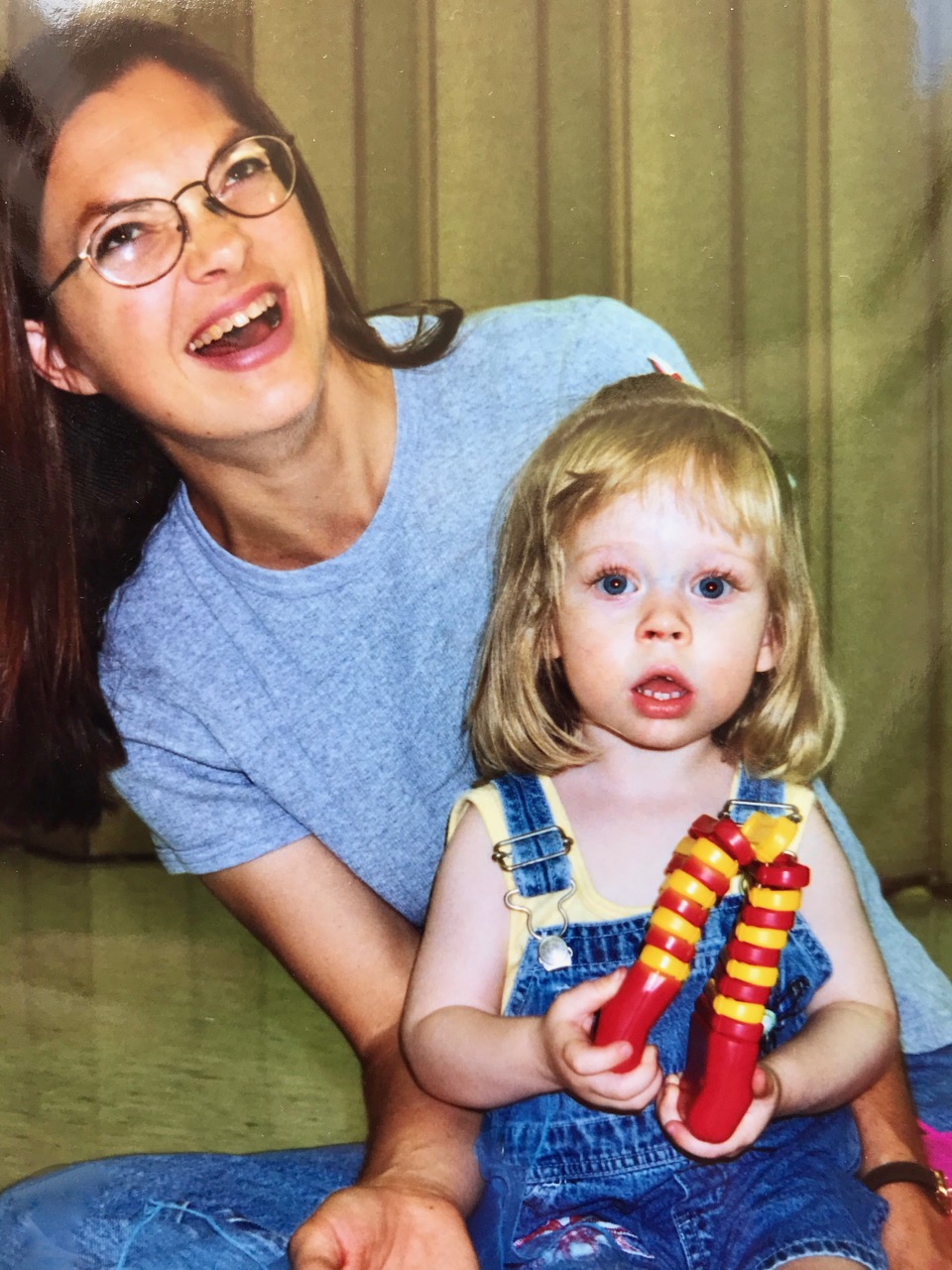 image of Kristin Shaeffer teaching music to a toddler.