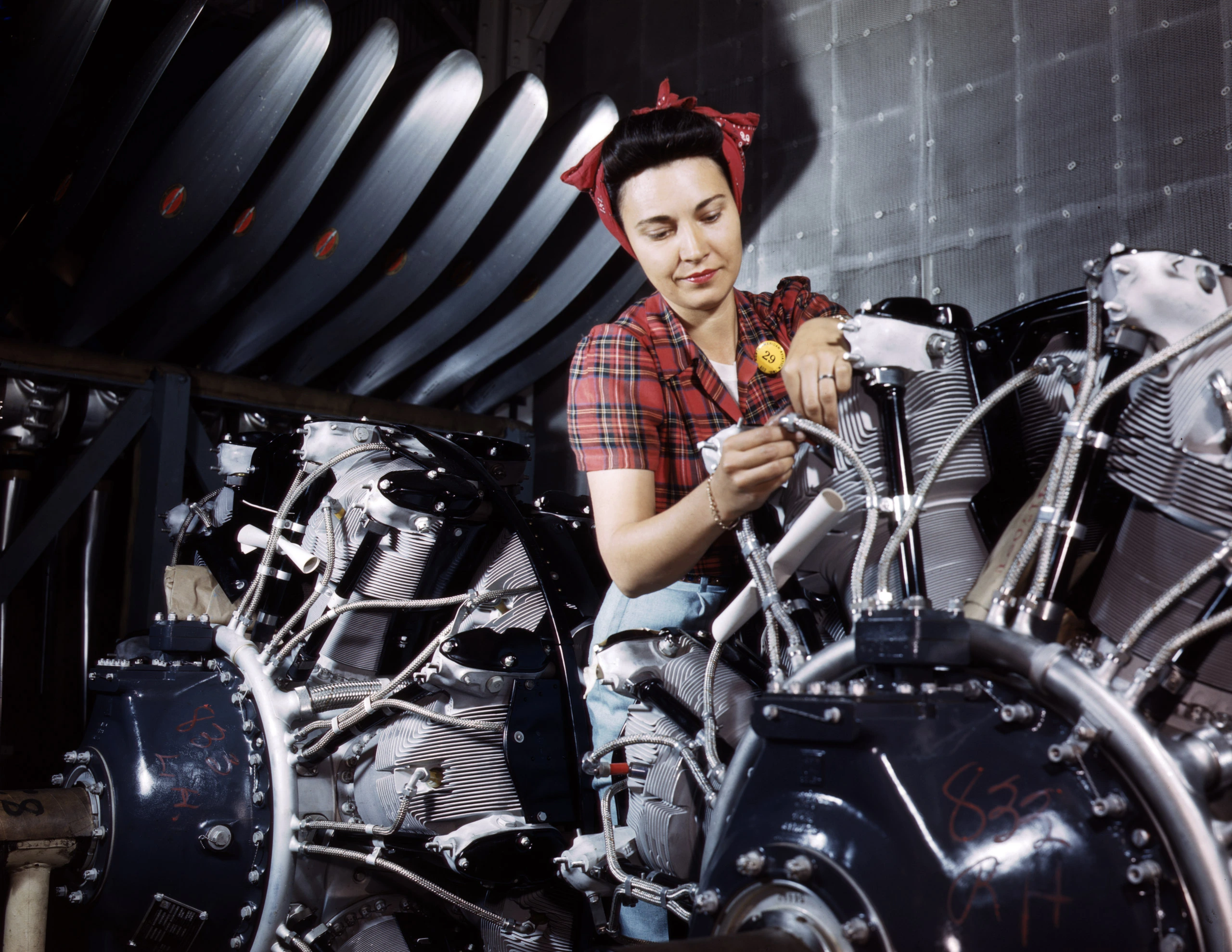 A real Rosie the Riveter works in a factory