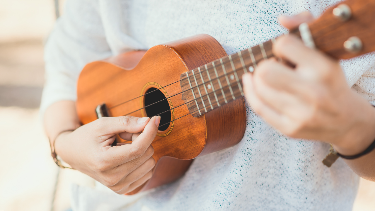 Girl playing ukulele