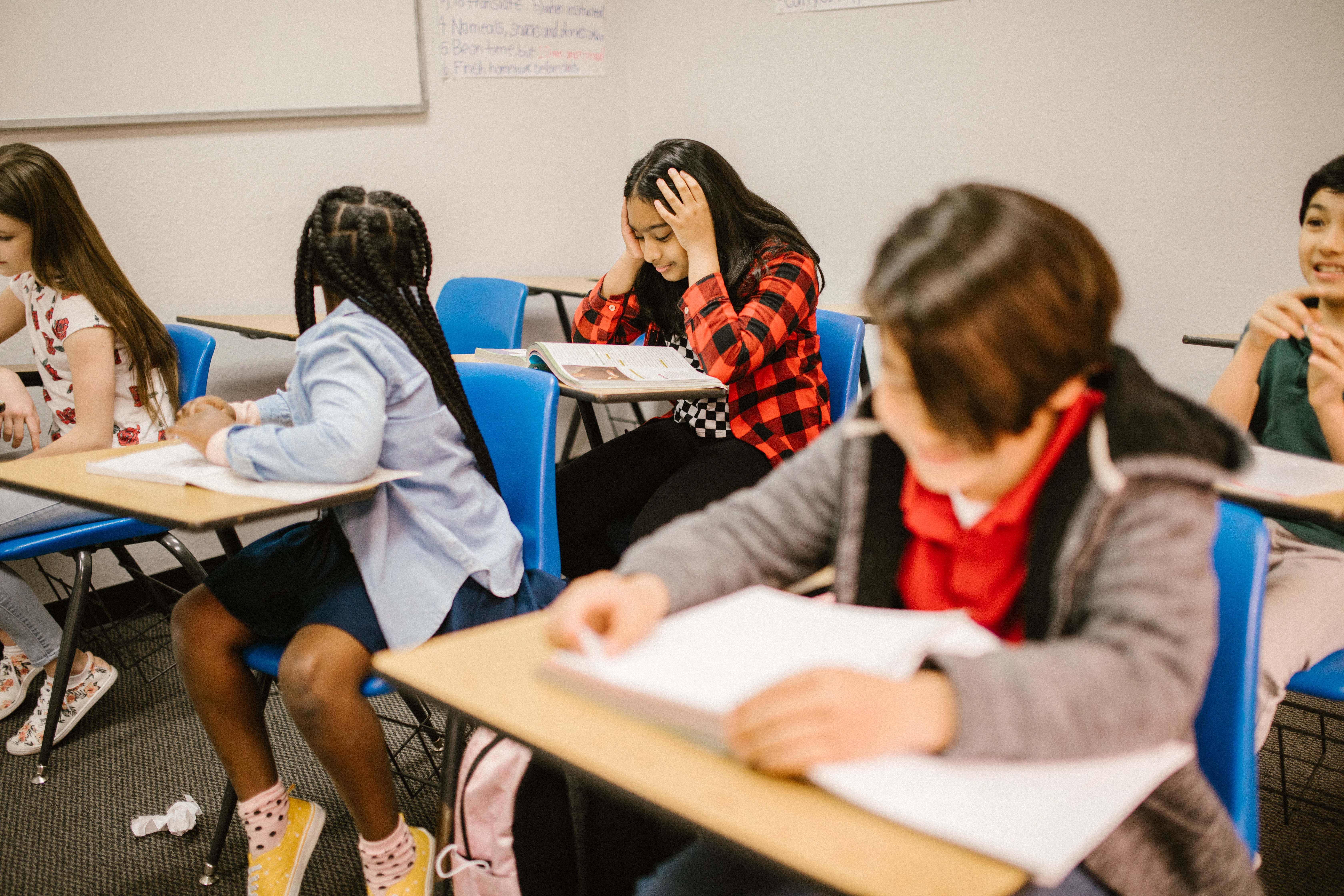 stressed out student sitting at desk