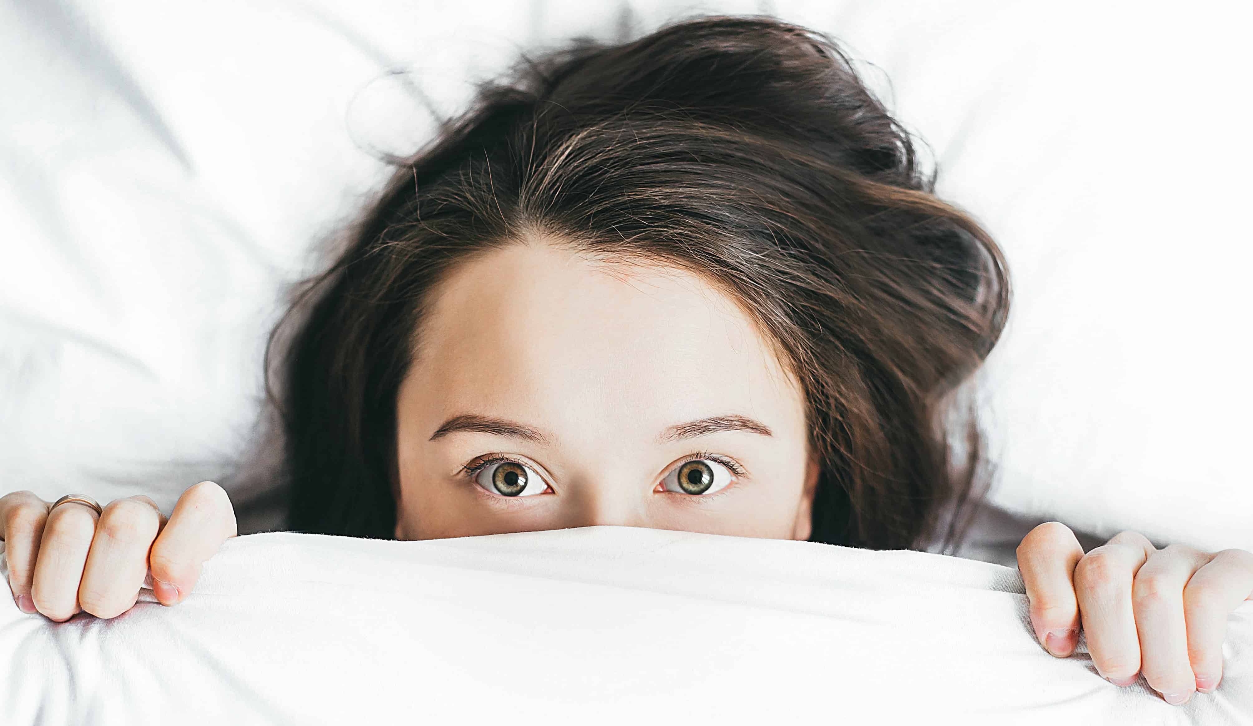 Bedtime procrastinator in bed