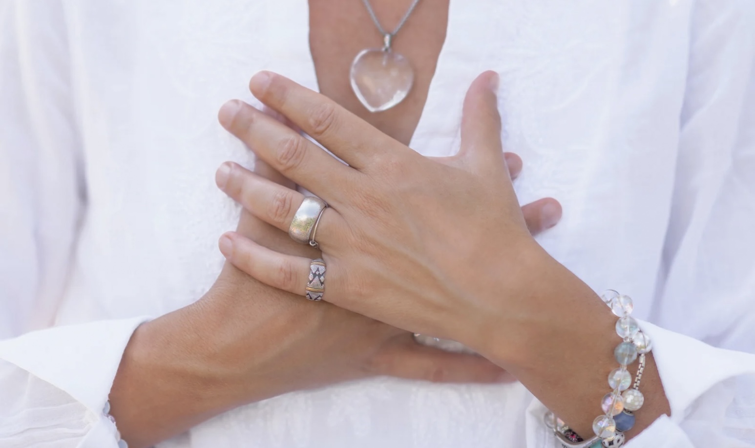 a group of women holding hands