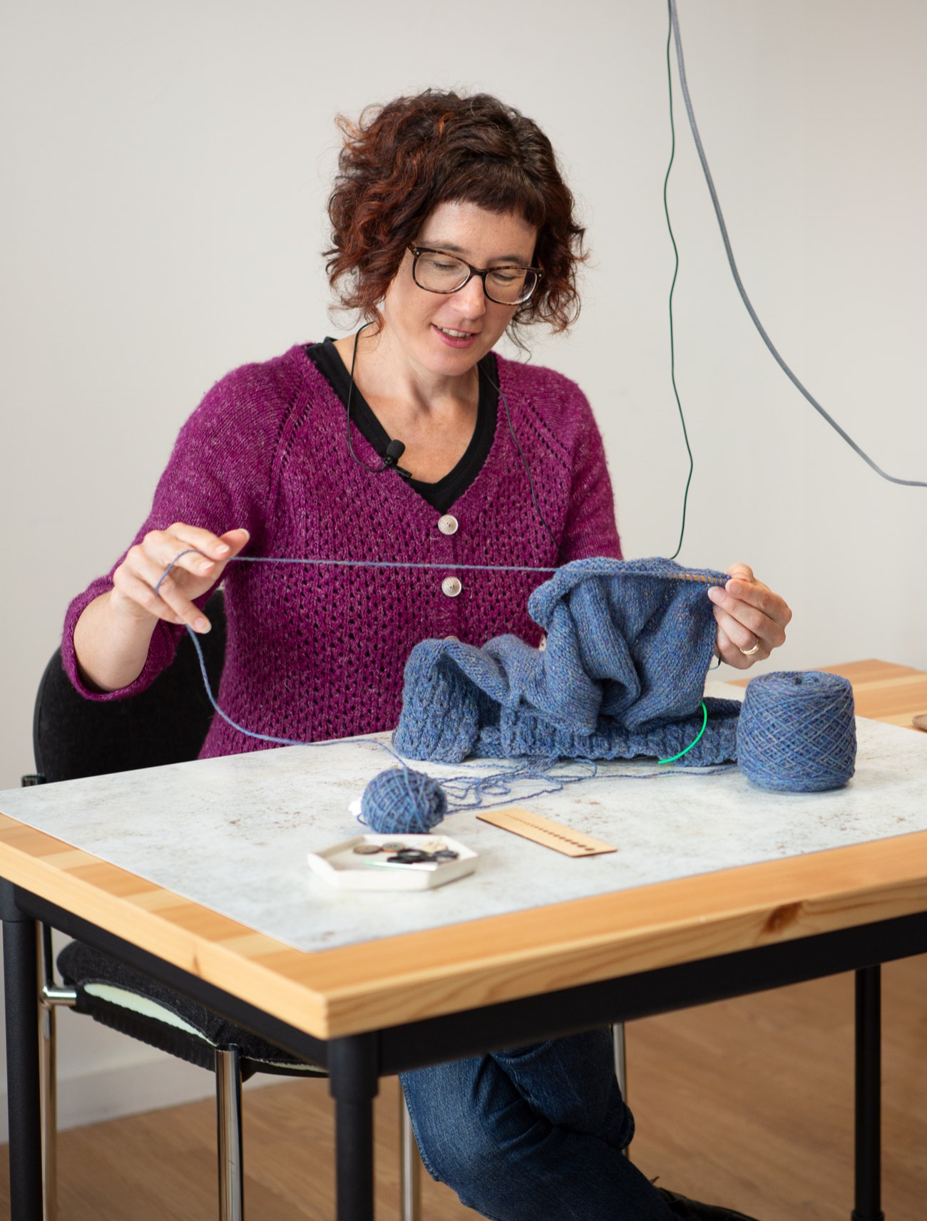 Carol Feller recording workshop with knitting in her hands