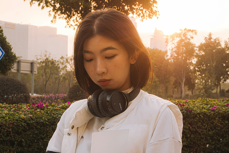 A woman wearing headphones