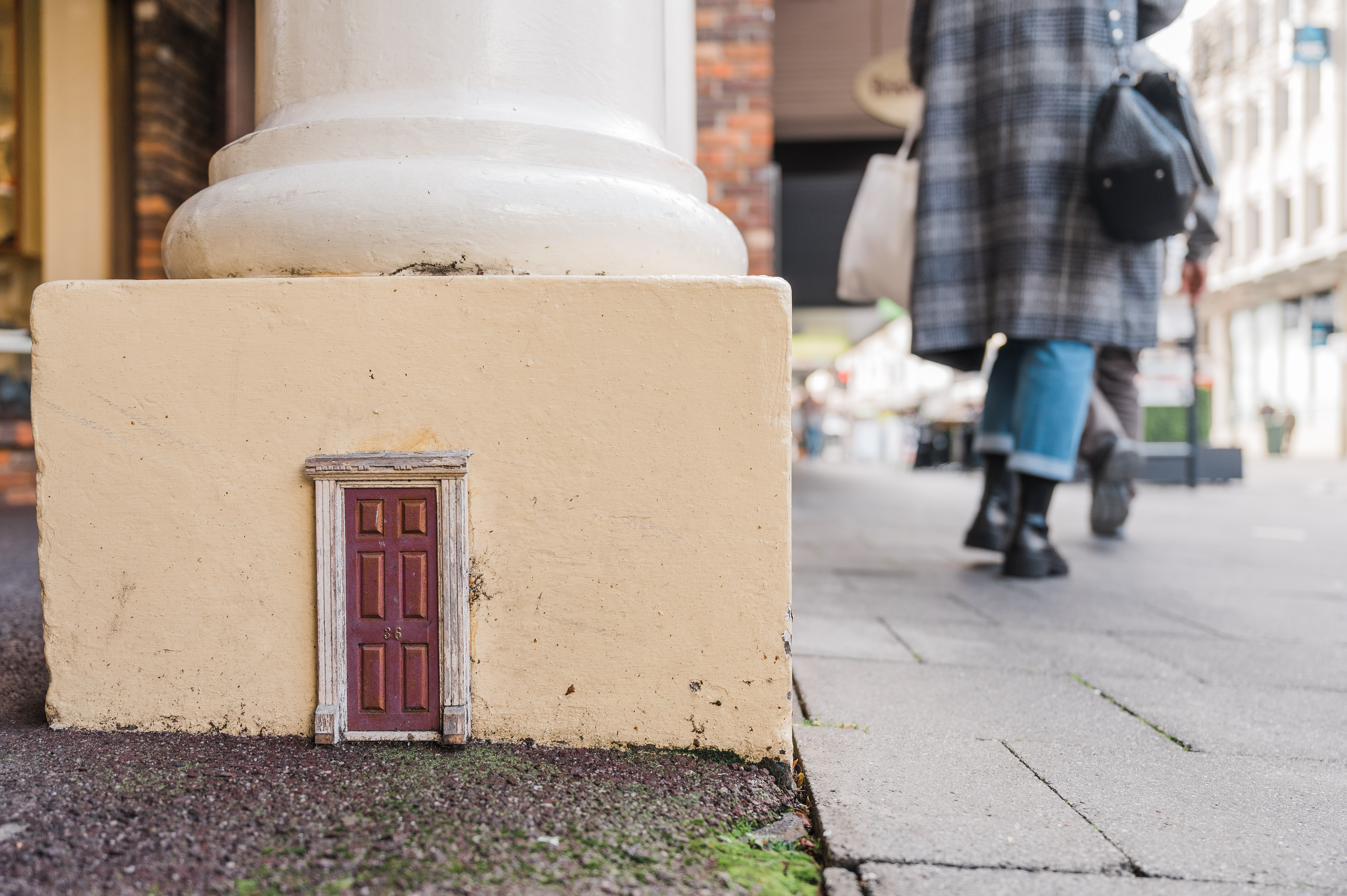 Image showing Launceston little door on the side of a building beside a sidewalk